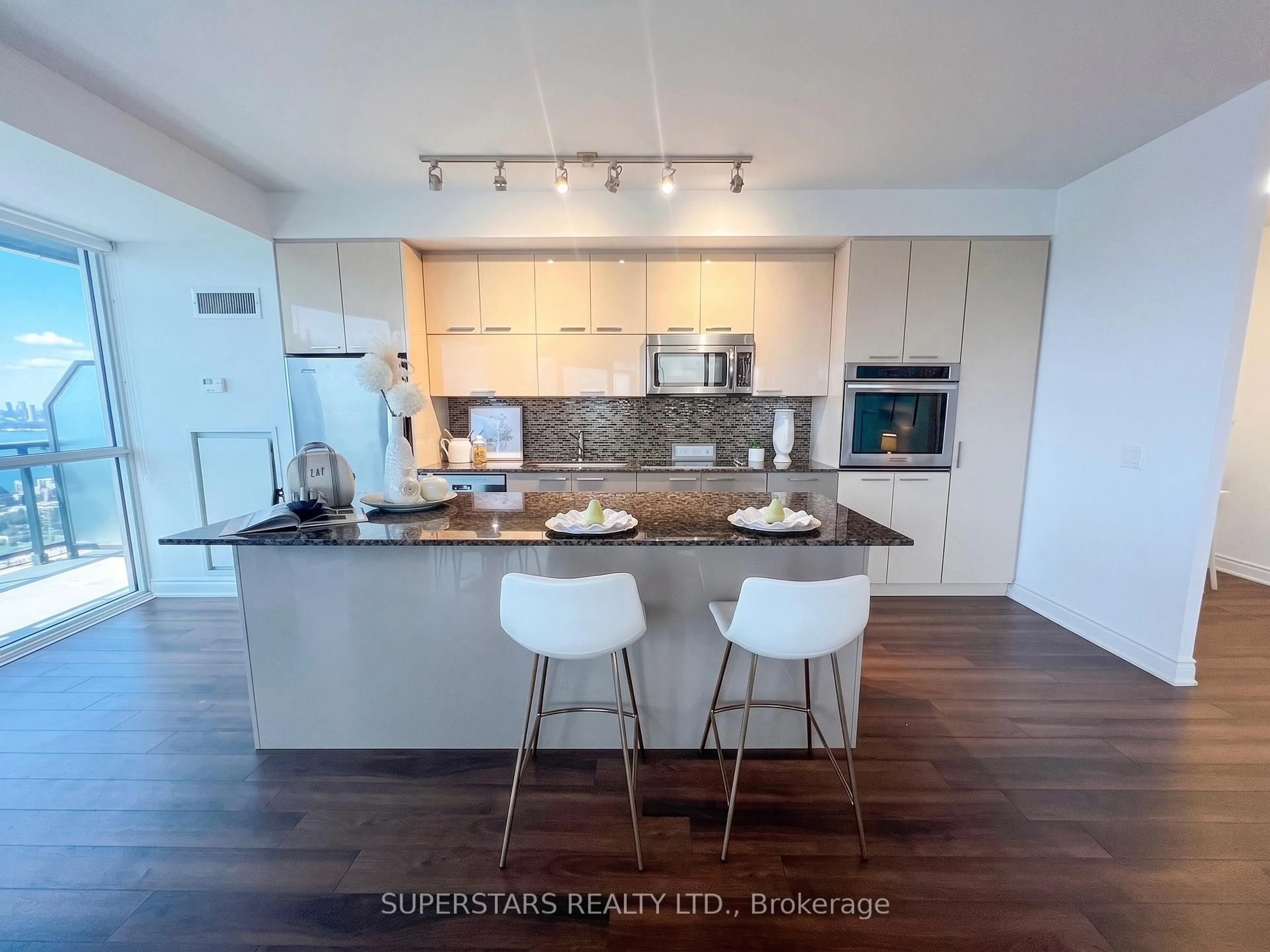 Open concept kitchen, wood/laminate floor for 80 Marine Parade Dr #2302, Toronto Ontario M8V 4B4