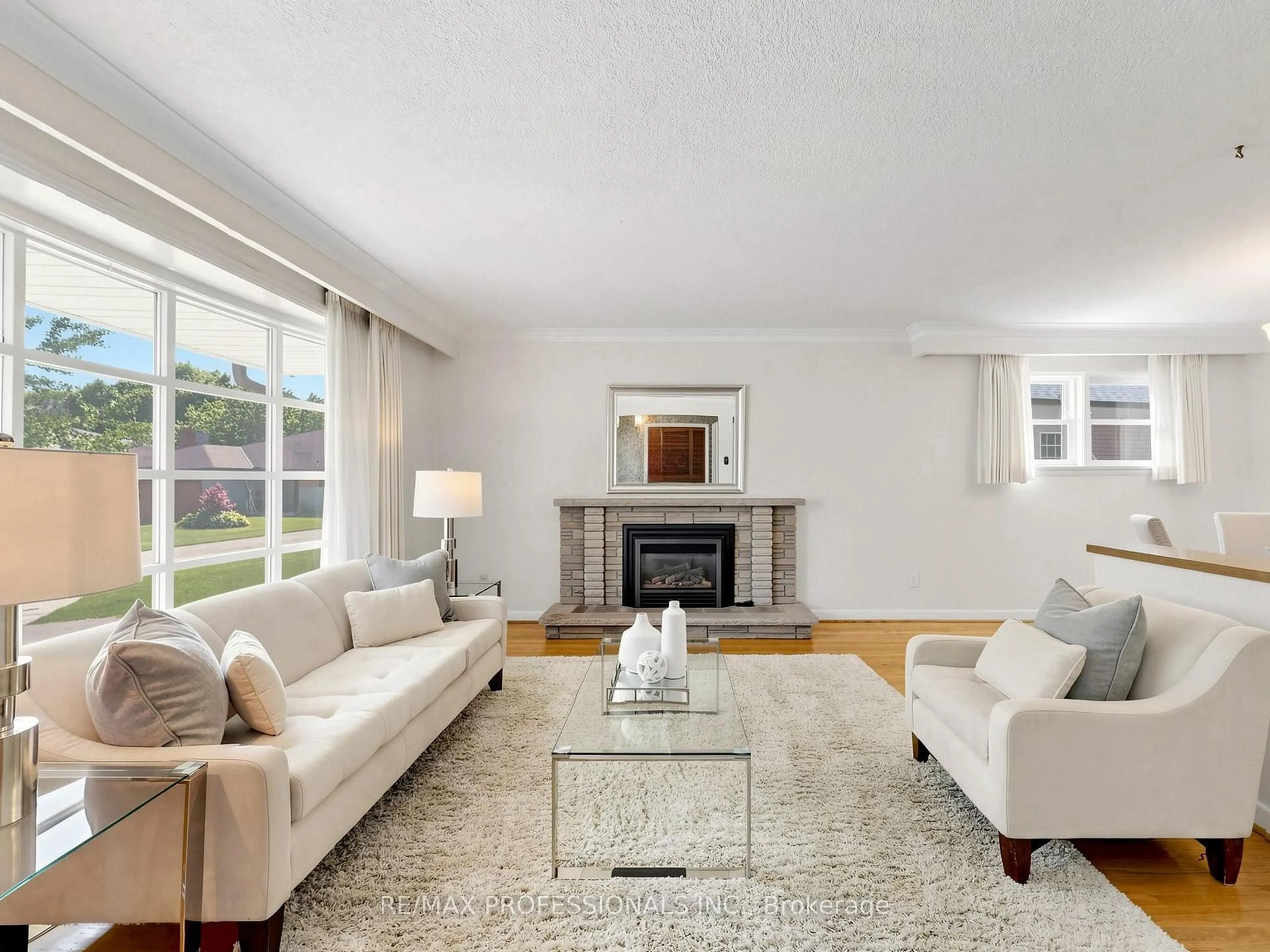 Living room with furniture, unknown for 49 Laurelwood Cres, Toronto Ontario M9P 1L6