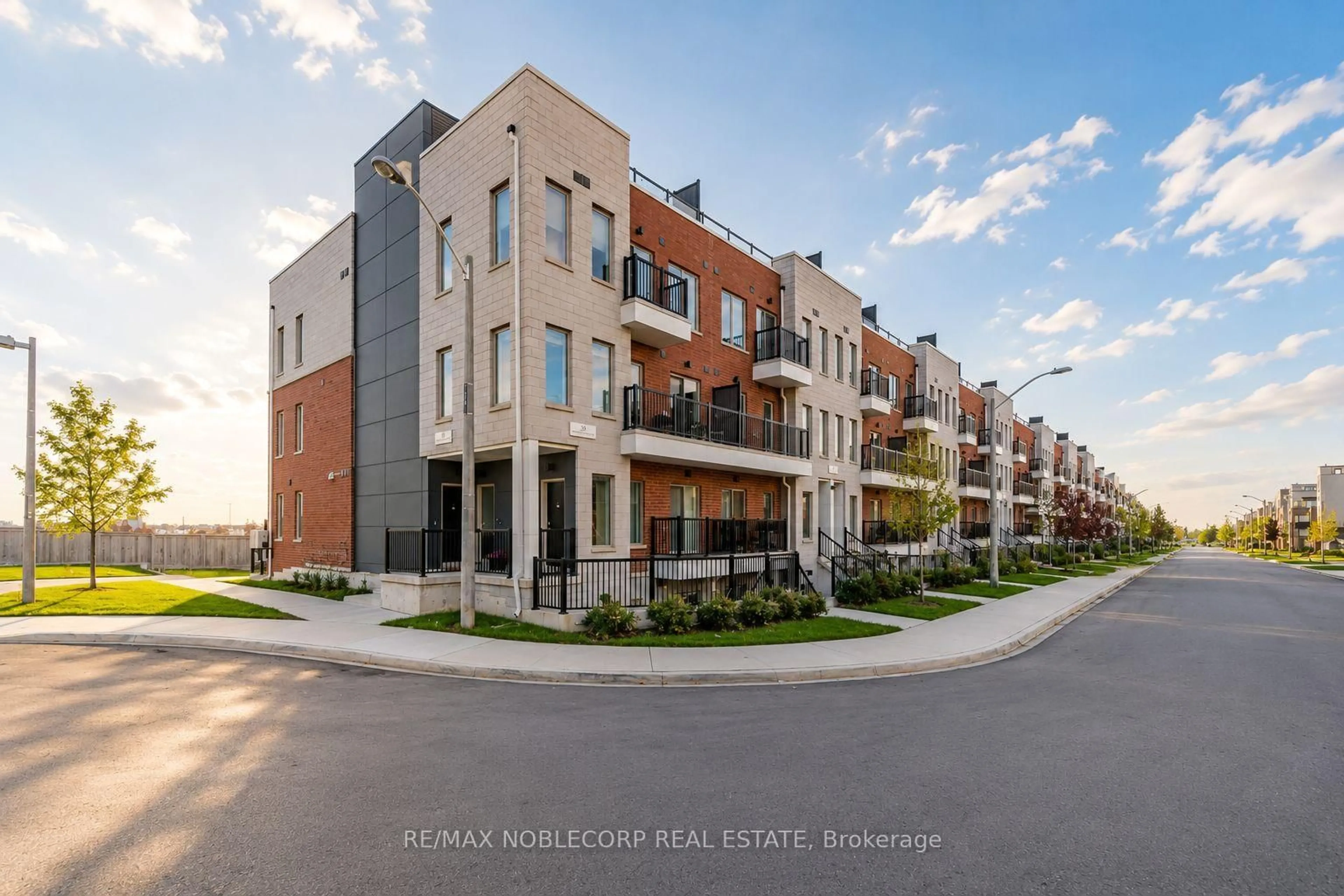 Home with brick exterior material, street for 39 John Perkins Bull Dr #22, Toronto Ontario M3K 0C3