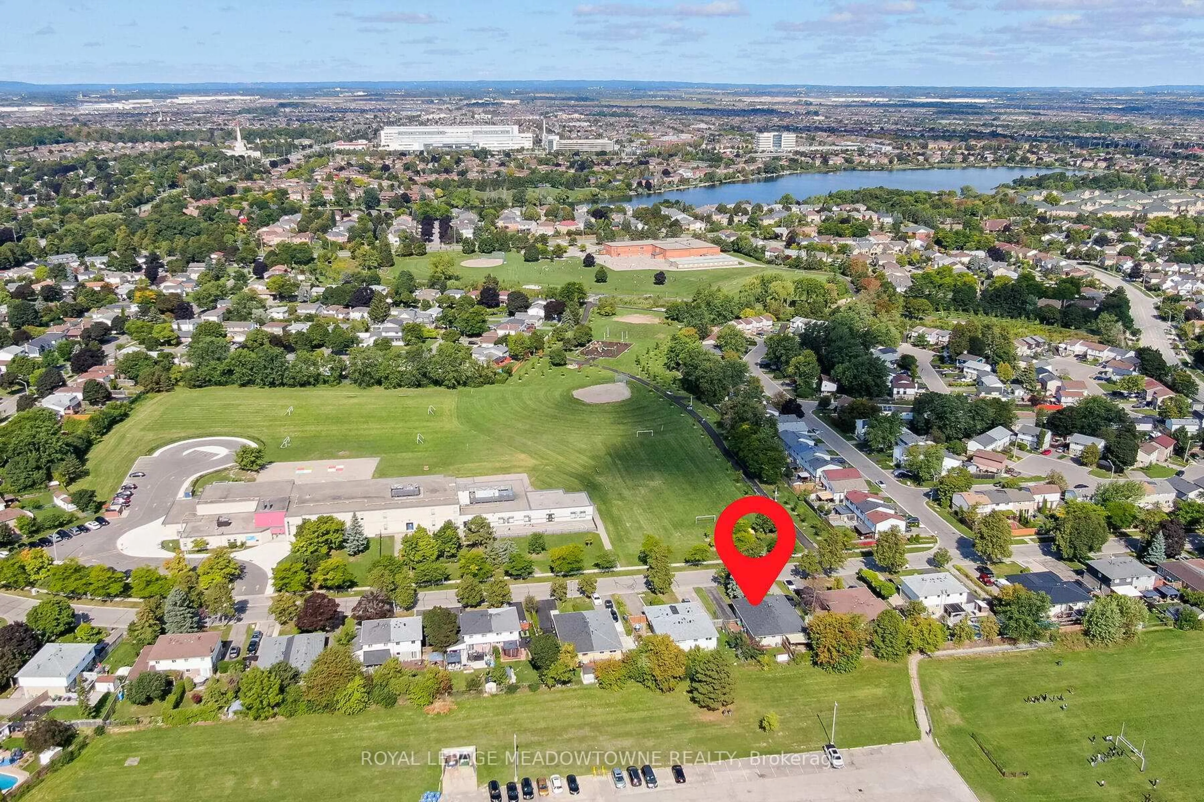 A pic from outside/outdoor area/front of a property/back of a property/a pic from drone, water/lake/river/ocean view for 73 Jefferson Rd, Brampton Ontario L6S 1W7