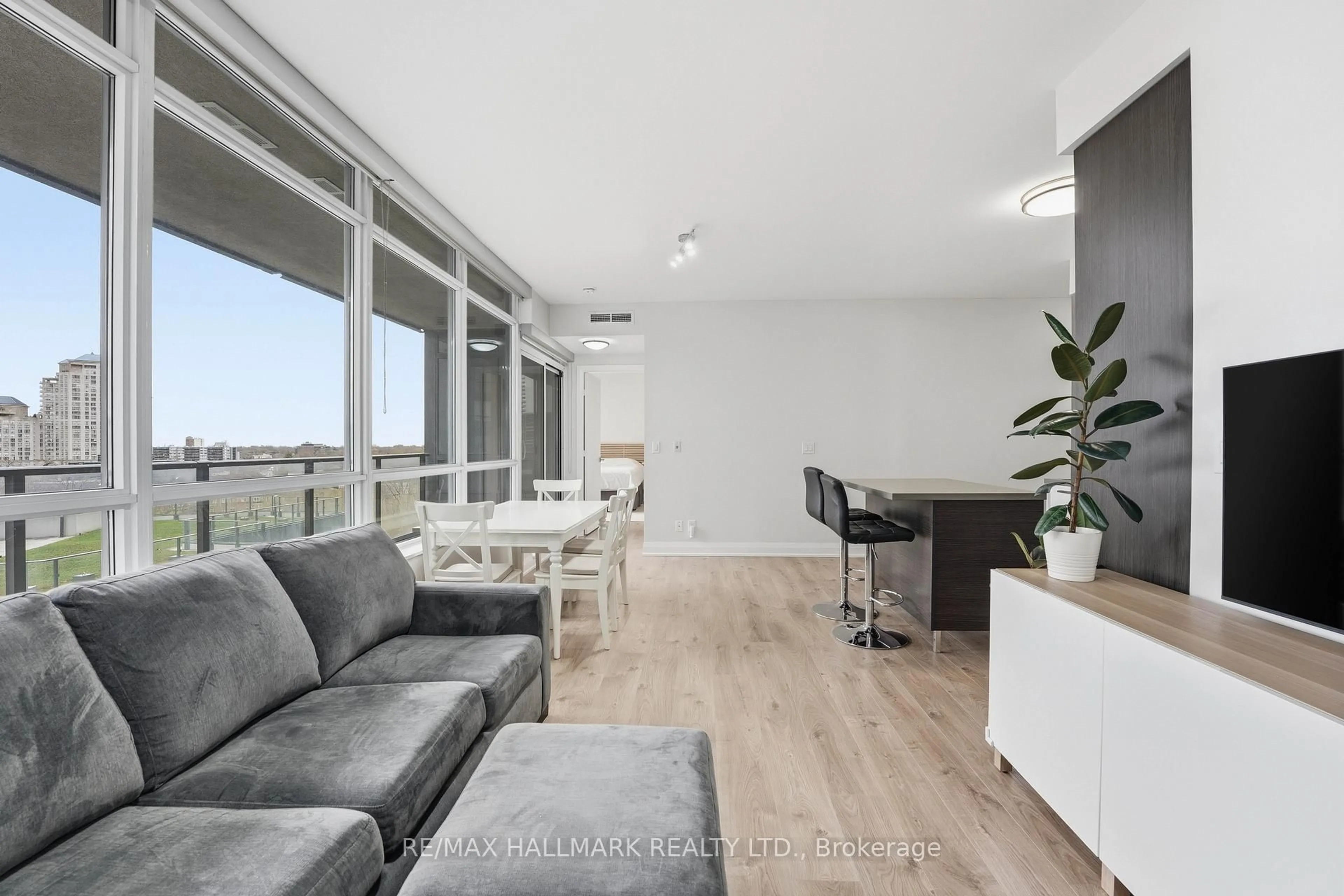 Living room with furniture, unknown for 36 Park Lawn Rd #710, Toronto Ontario M8Y 0E5