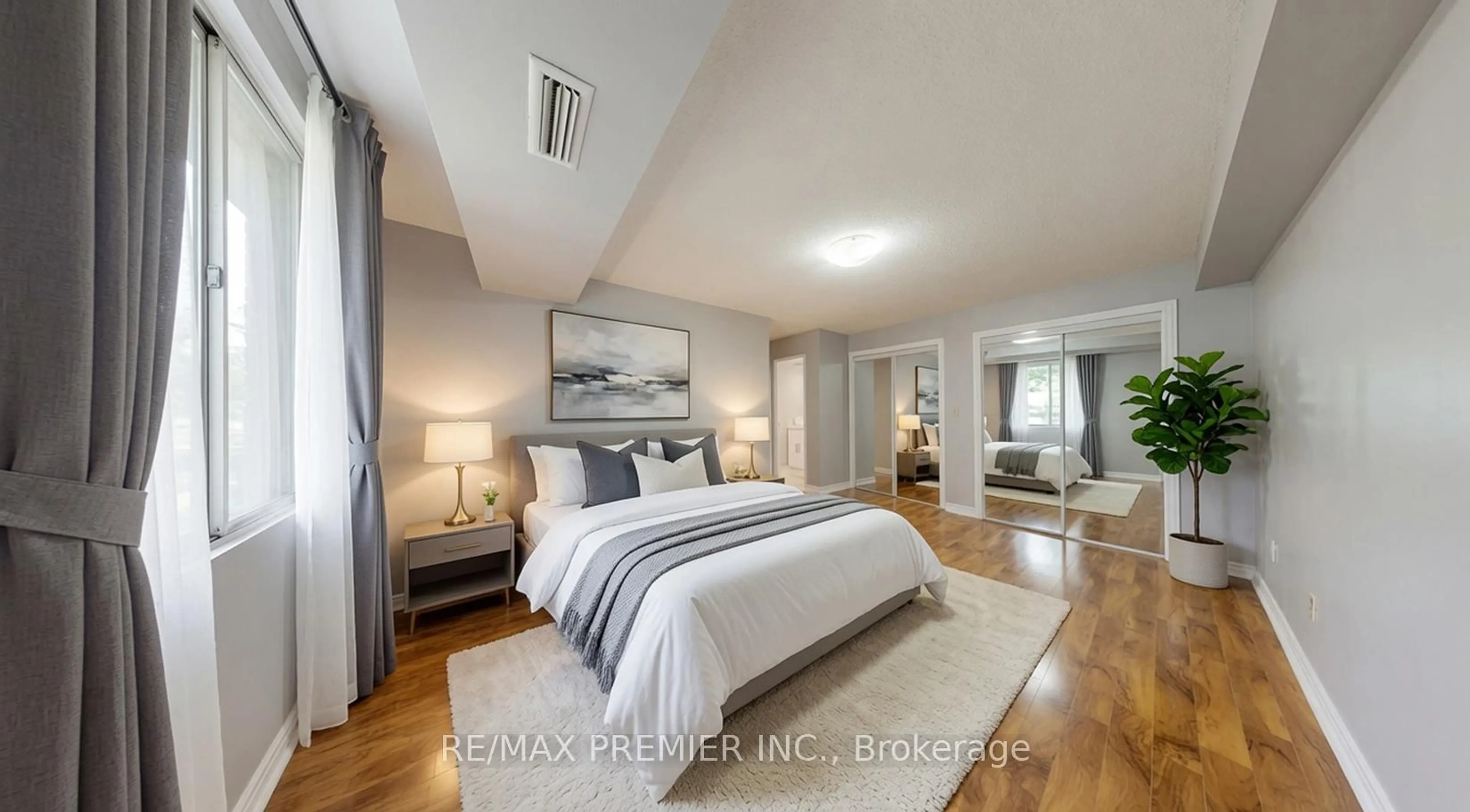 Bedroom with bed, wood/laminate floor for 1250 Mississauga Valley Blvd #51, Mississauga Ontario L5A 3R6