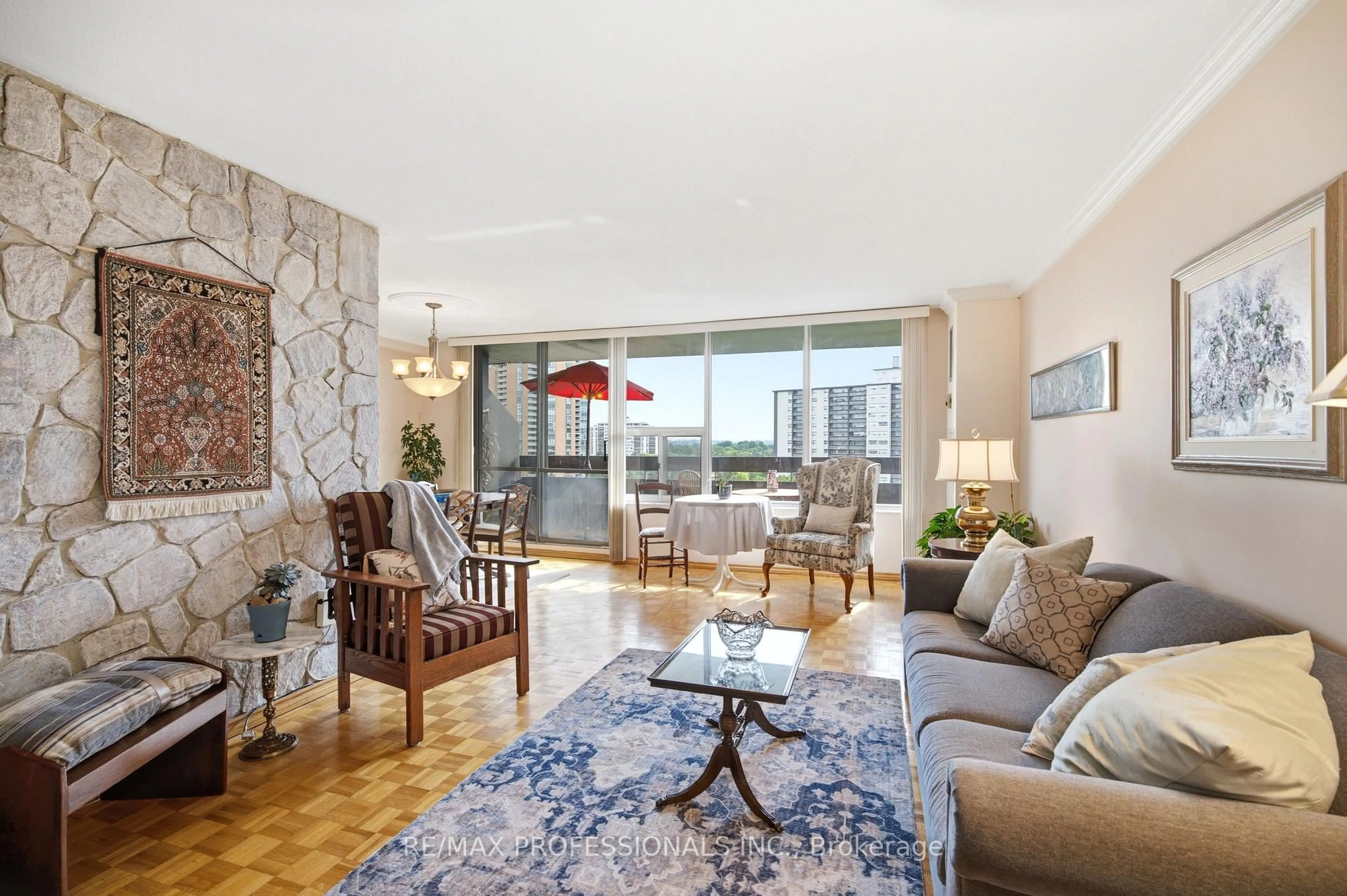 Living room with furniture, unknown for 11 Wincott Dr #1208, Toronto Ontario M9R 2R9