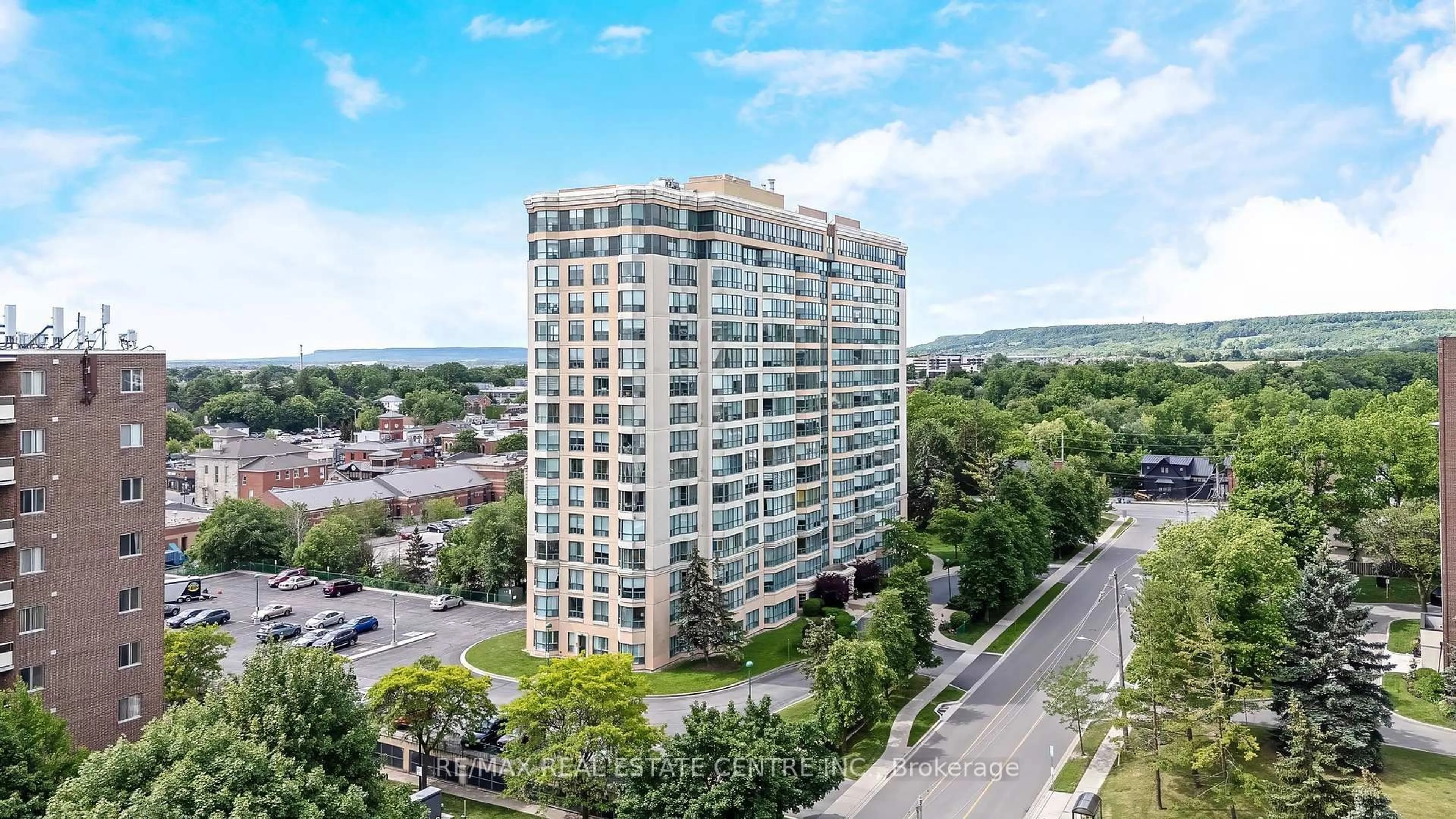 A pic from outside/outdoor area/front of a property/back of a property/a pic from drone, city buildings view from balcony for 100 Millside Dr #1202, Milton Ontario L9T 5E2