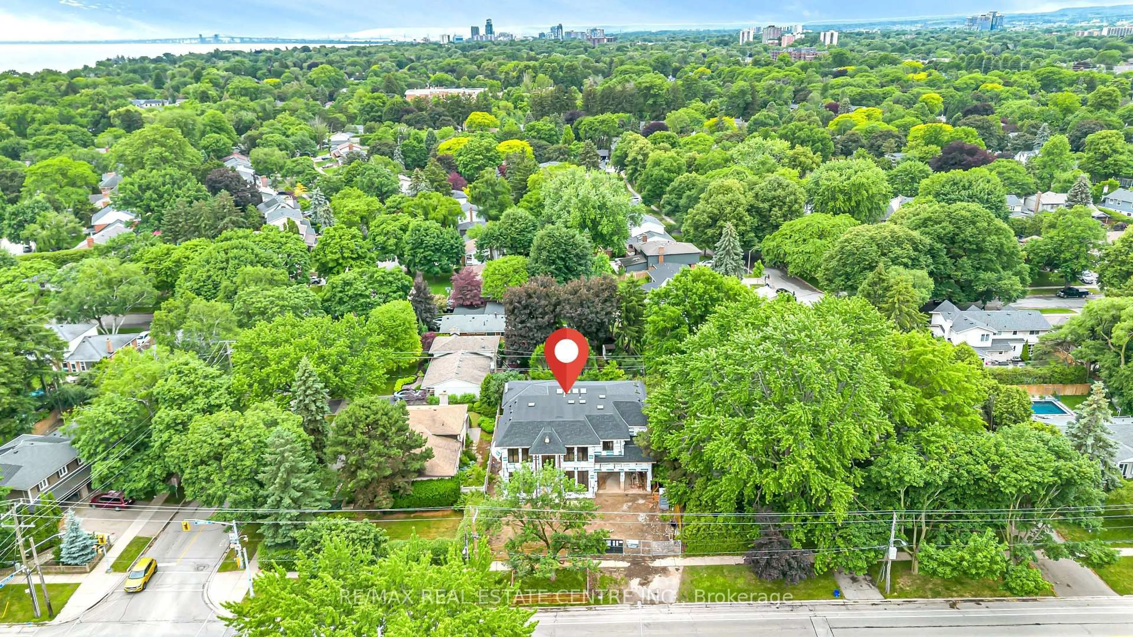 A pic from outside/outdoor area/front of a property/back of a property/a pic from drone, unknown for 320 Walkers Line, Burlington Ontario L7N 2C7