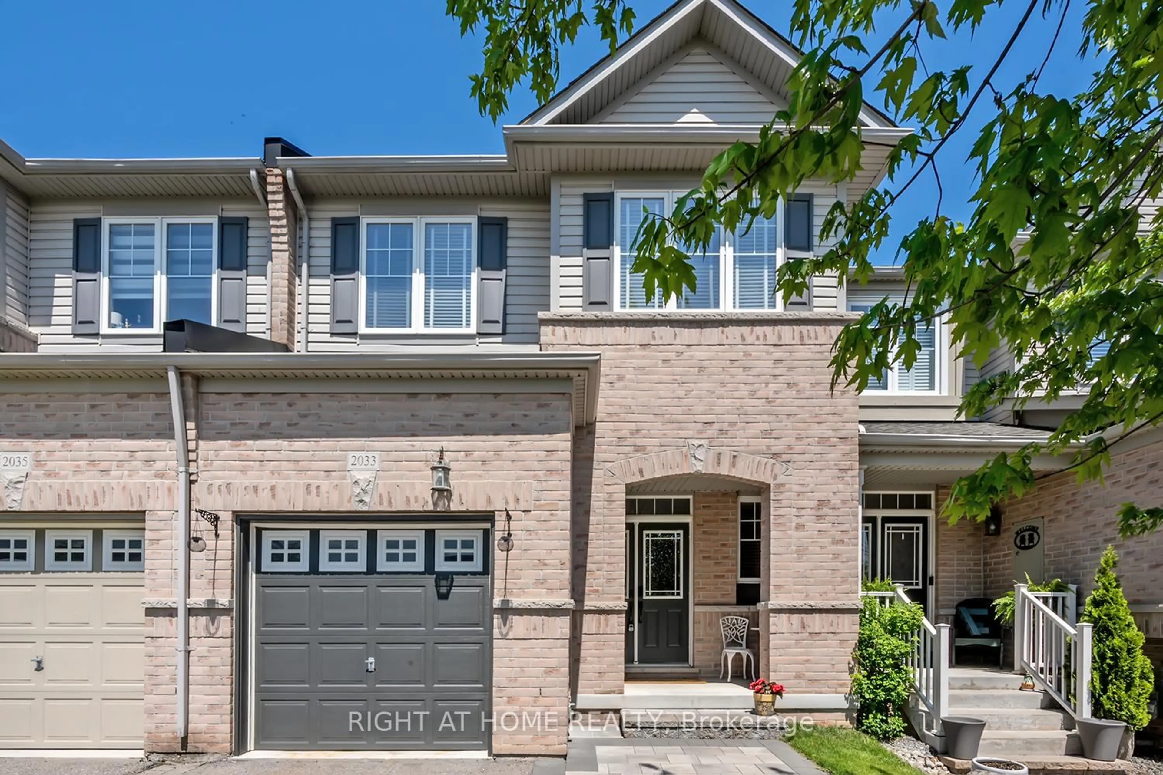 Home with brick exterior material, street for 2033 Trawden Way, Oakville Ontario L6M 0M2