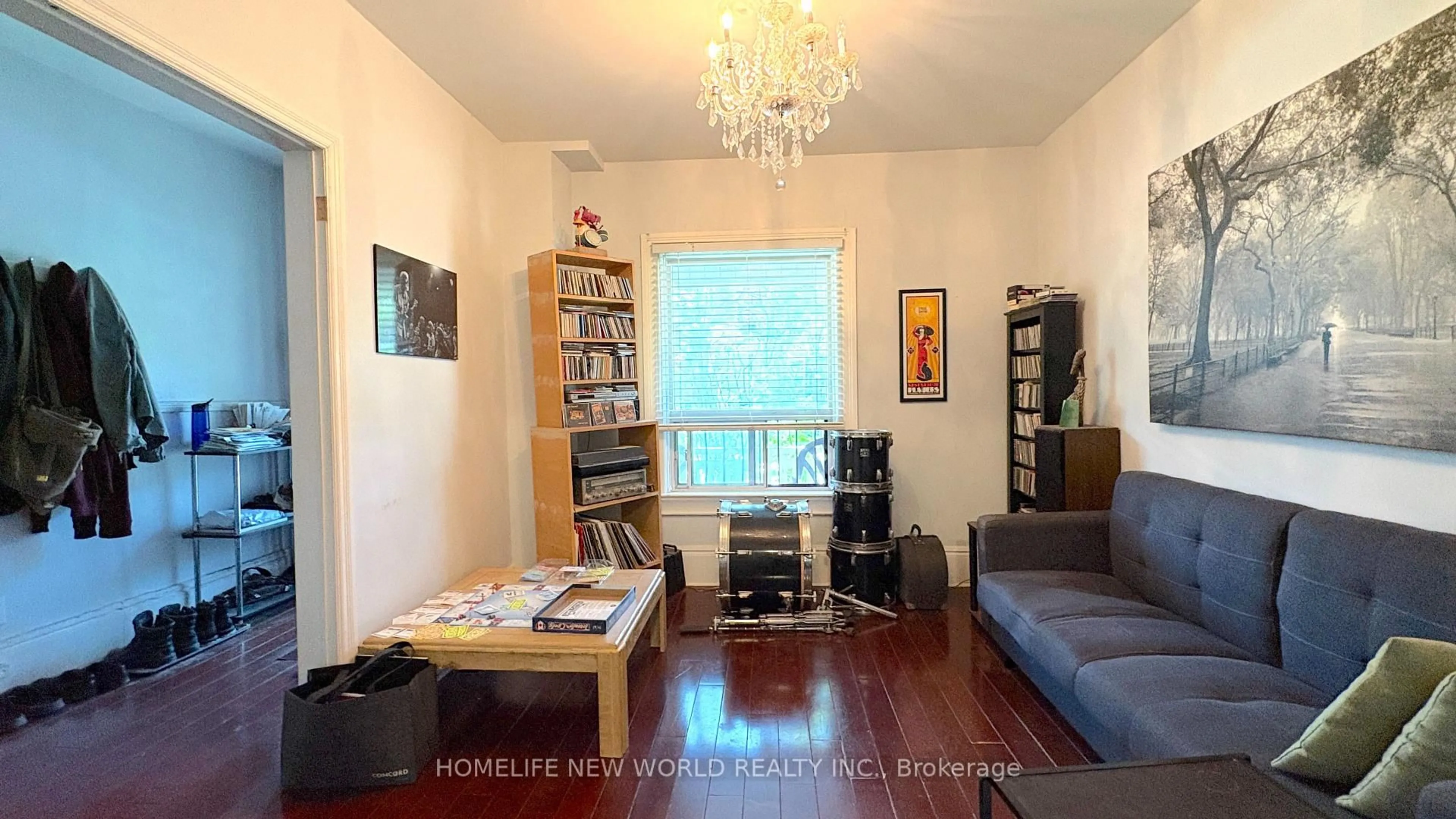 Living room with furniture, wood/laminate floor for 8 Burnfield Ave, Toronto Ontario M6G 1Y5