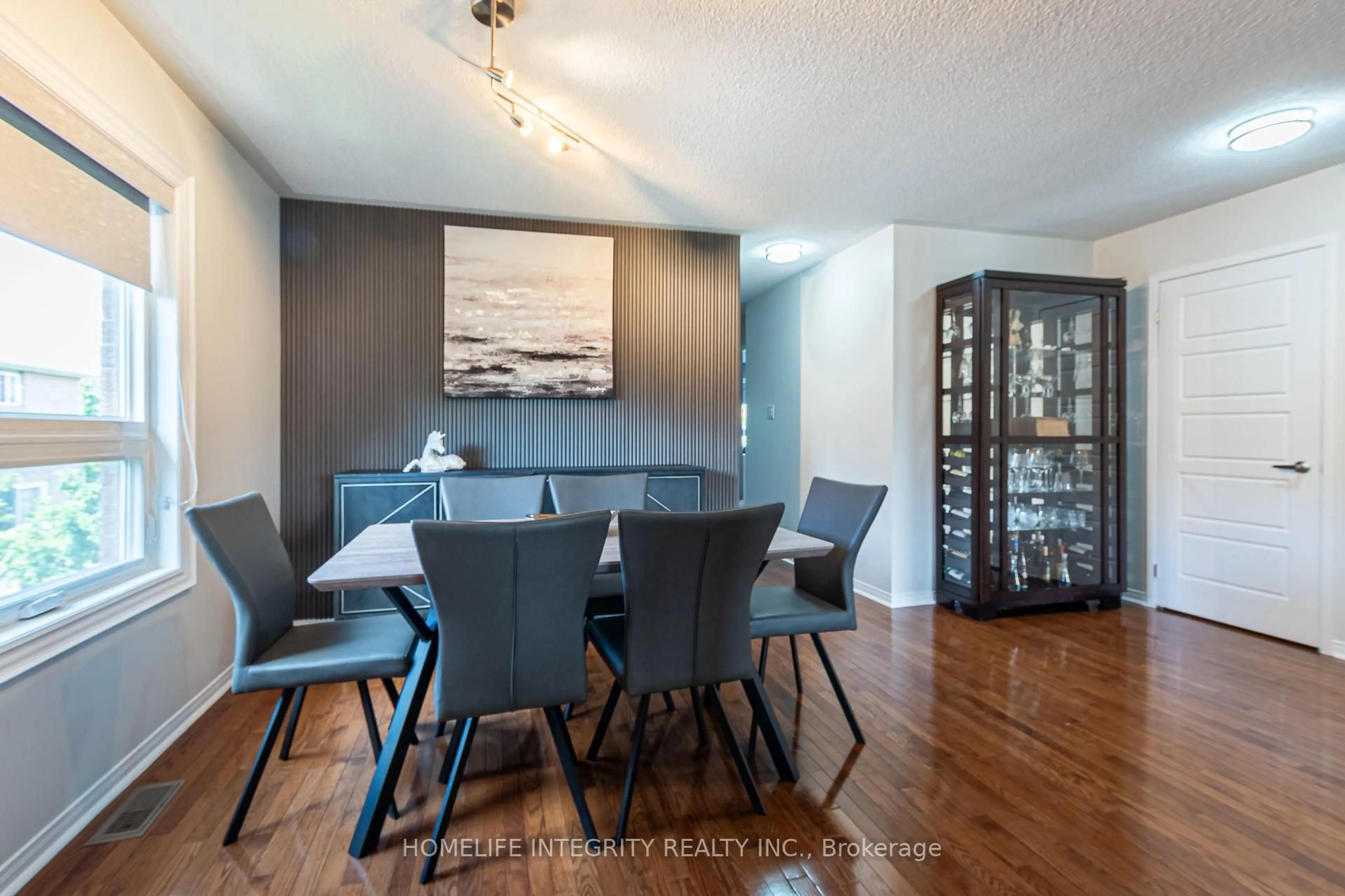 Dining room, wood/laminate floor for 4 Silverbell Crt, Brampton Ontario L7A 3V3