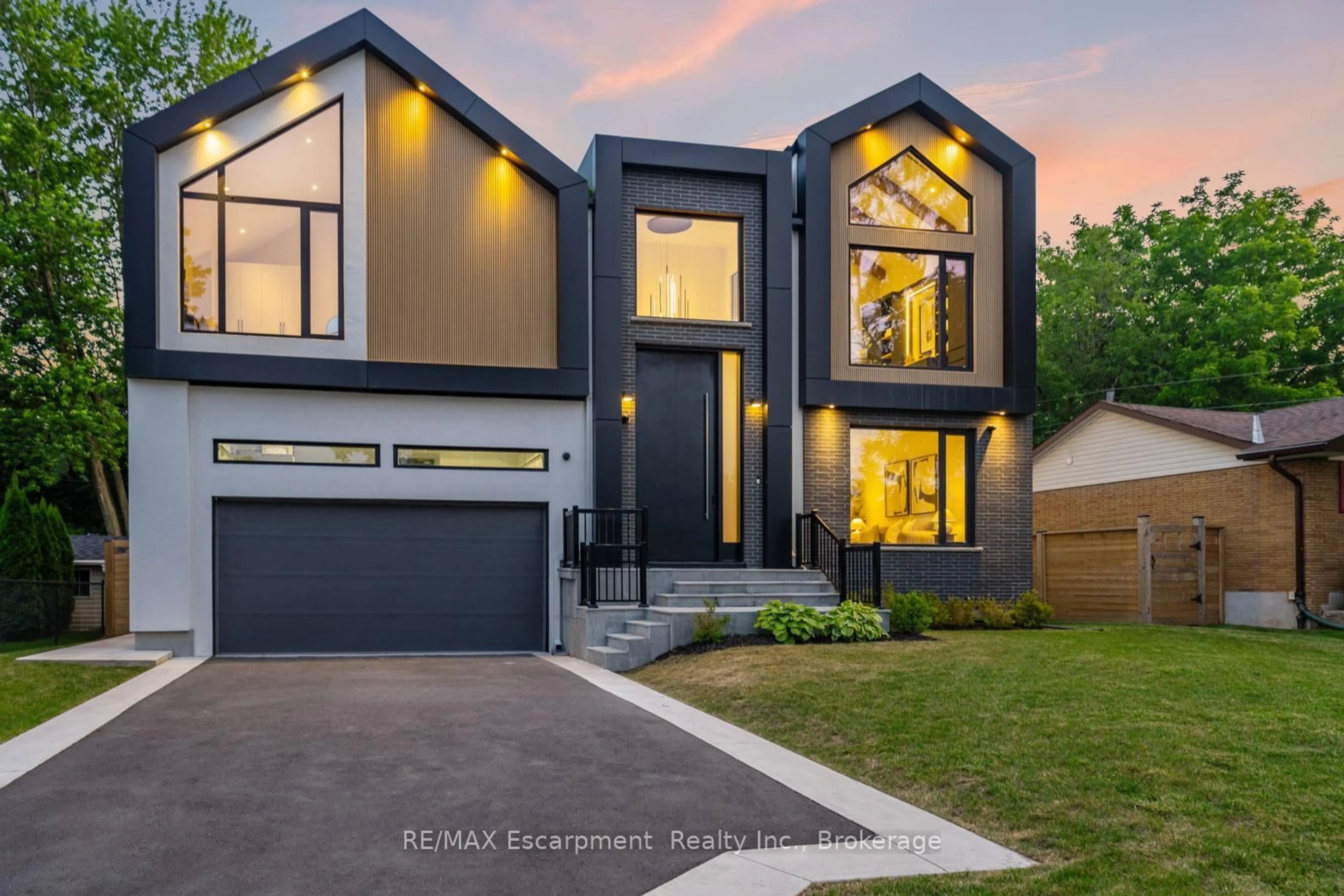Home with brick exterior material, street for 298 Strathcona Dr, Burlington Ontario L7L 2E1