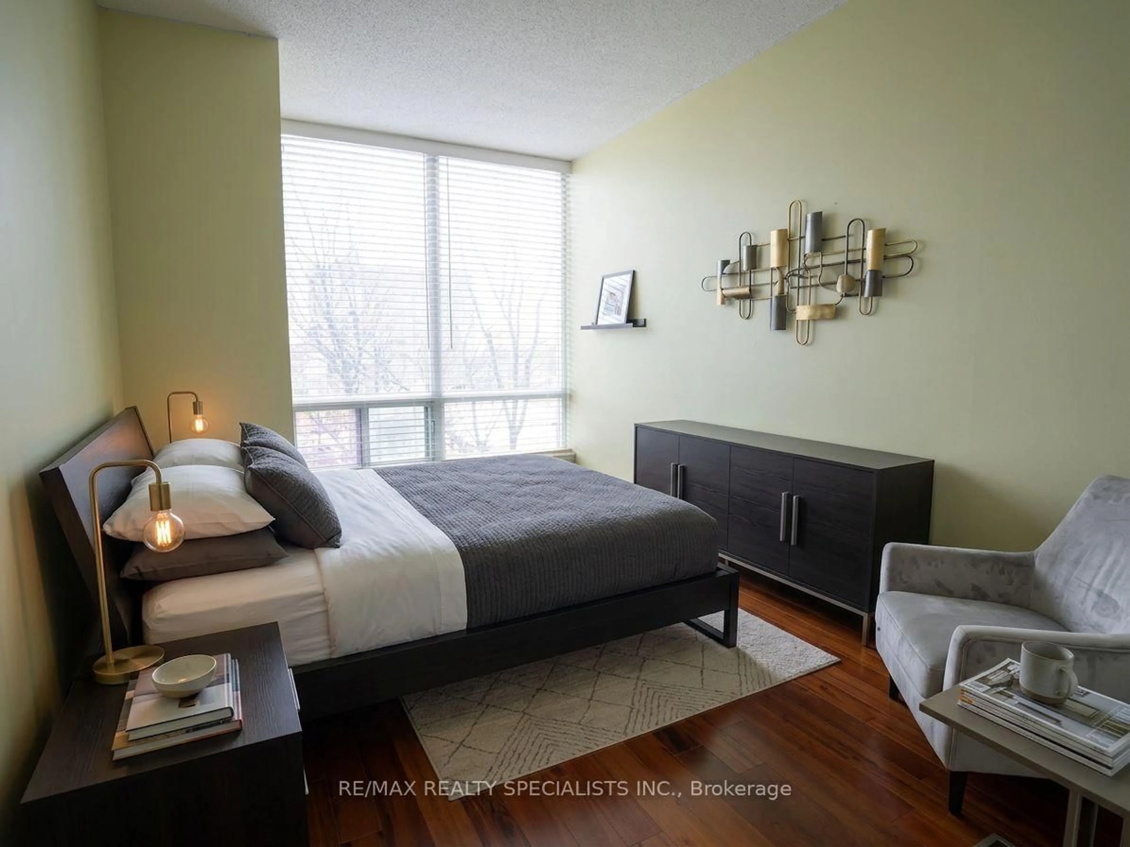 Bedroom with bed, wood/laminate floor for 3504 Hurontario St #307, Mississauga Ontario L5B 0B9