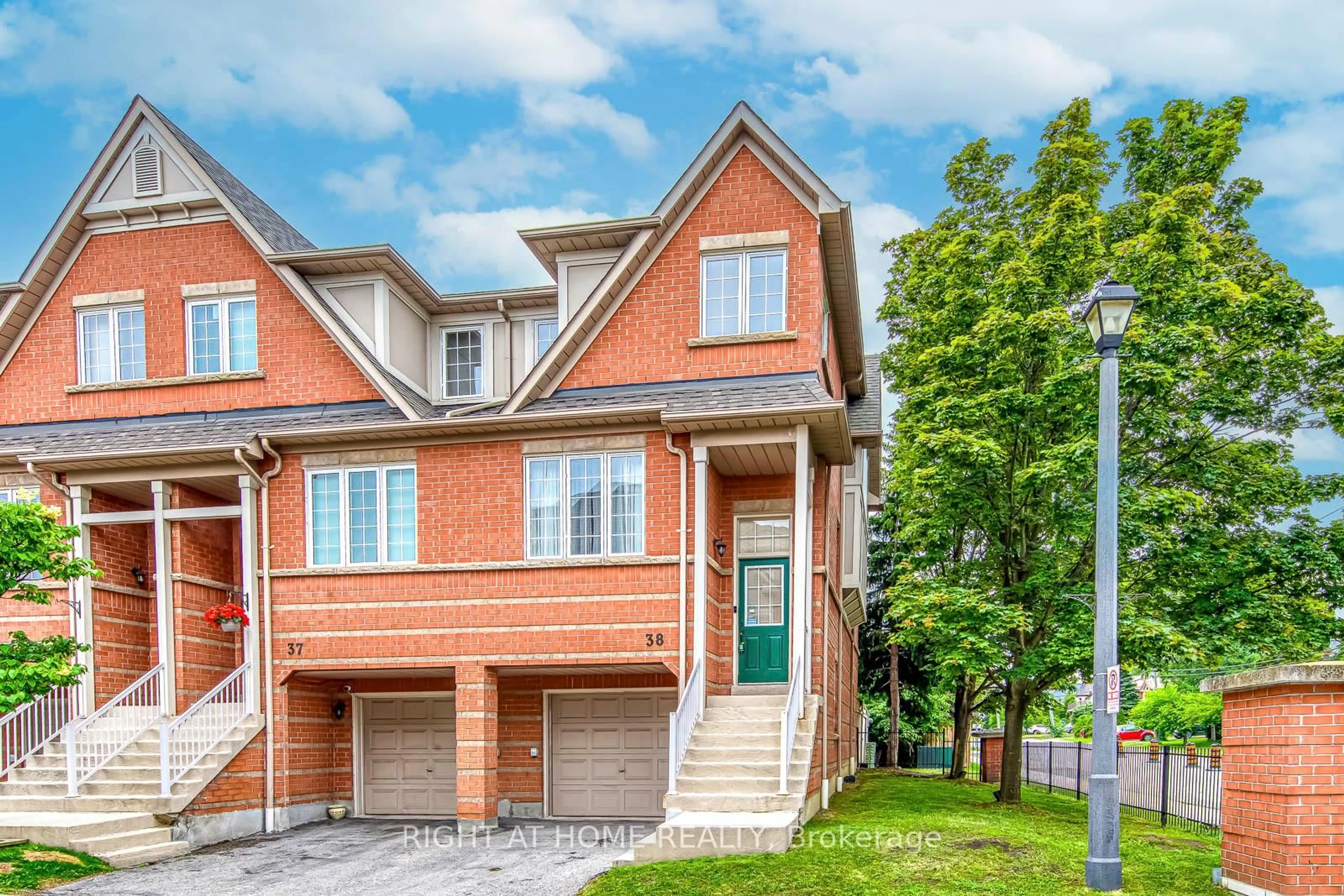 Home with brick exterior material, street for 38 Fairview Rd #38, Mississauga Ontario L5B 4J8