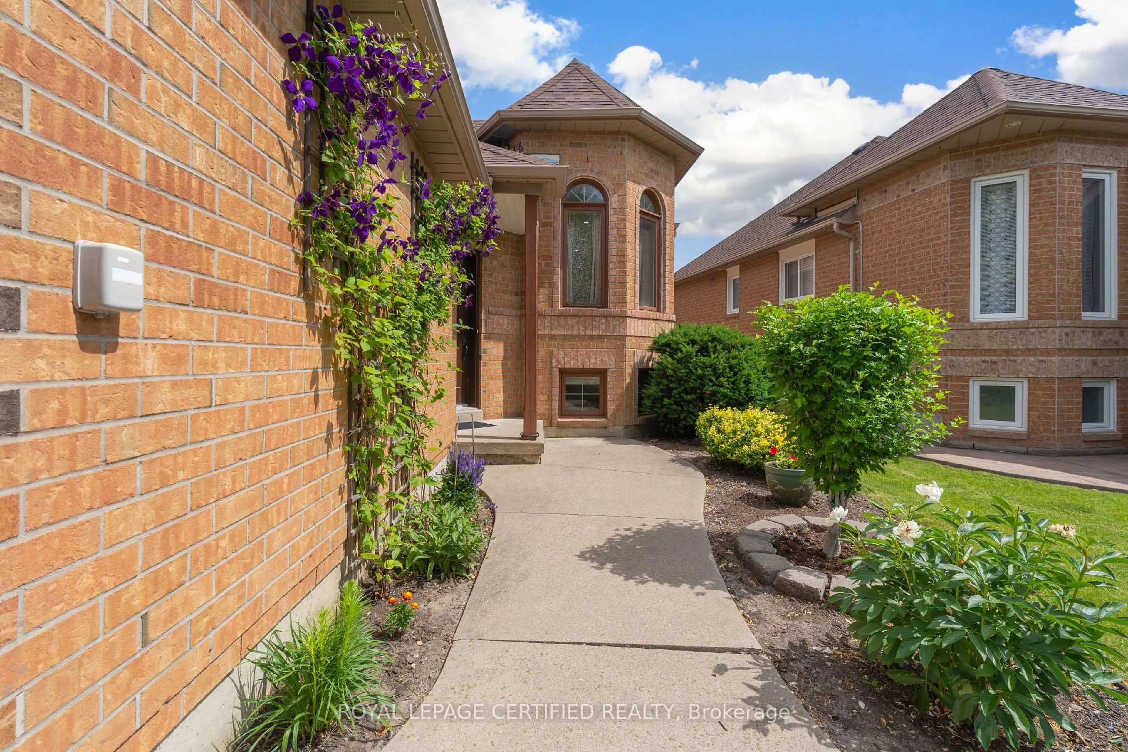 Home with brick exterior material, street for 45 Springview Dr, Brampton Ontario L6X 4M3