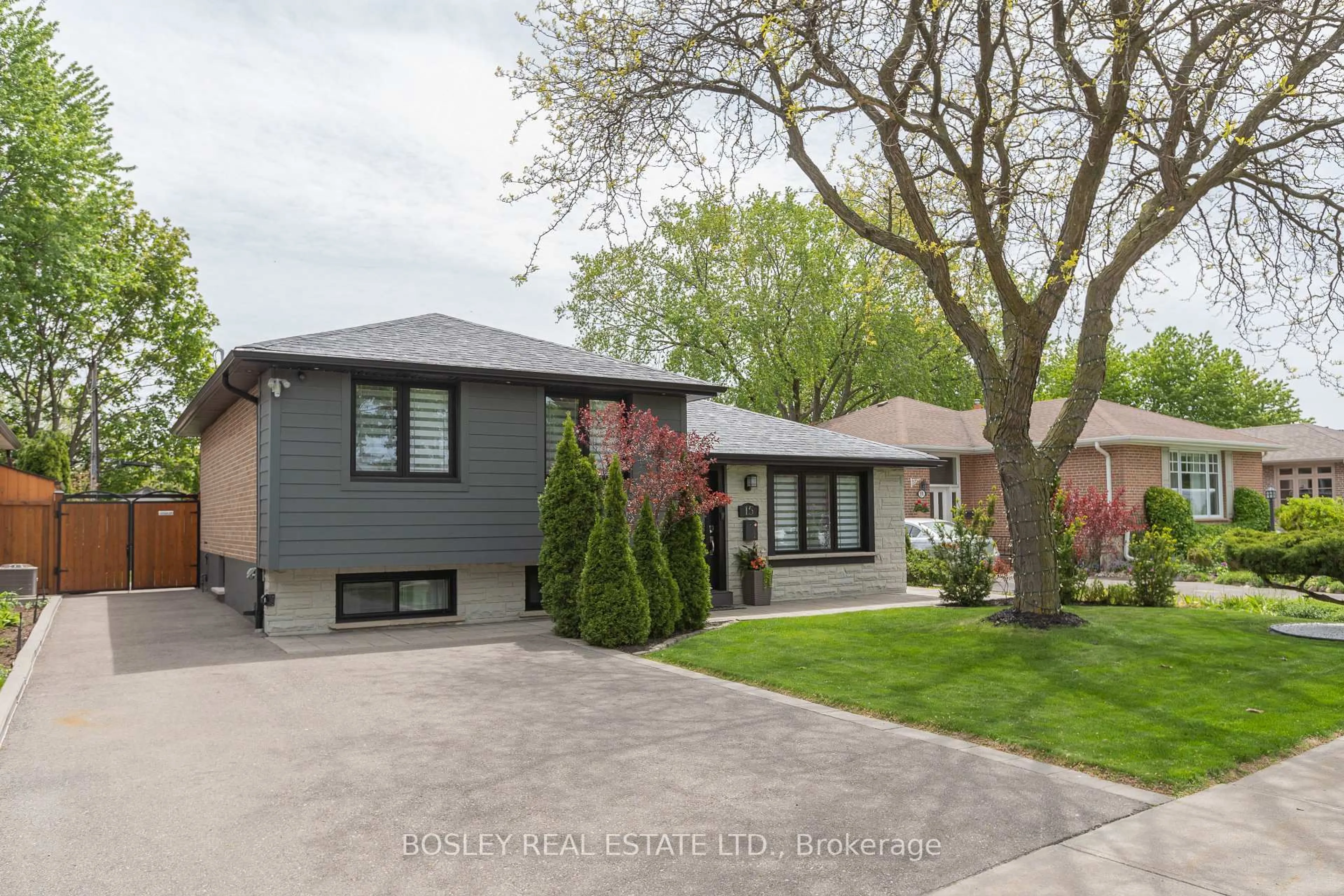 Home with brick exterior material, street for 15 Wareside Rd, Toronto Ontario M9C 3B1