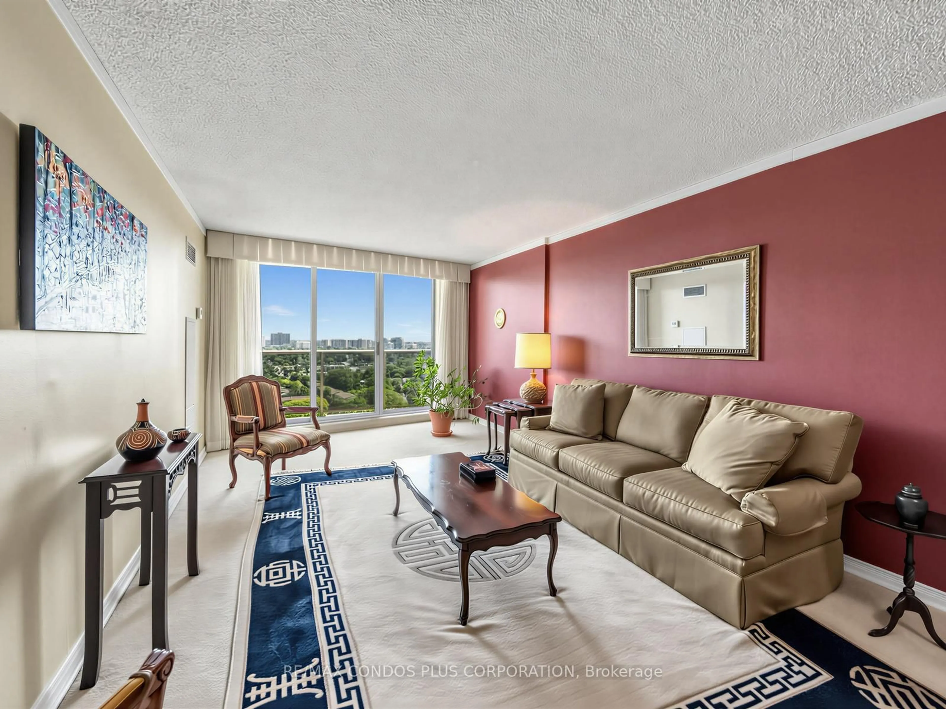 Living room with furniture, carpet floor for 299 Mill Rd #1903, Toronto Ontario M9C 4V9