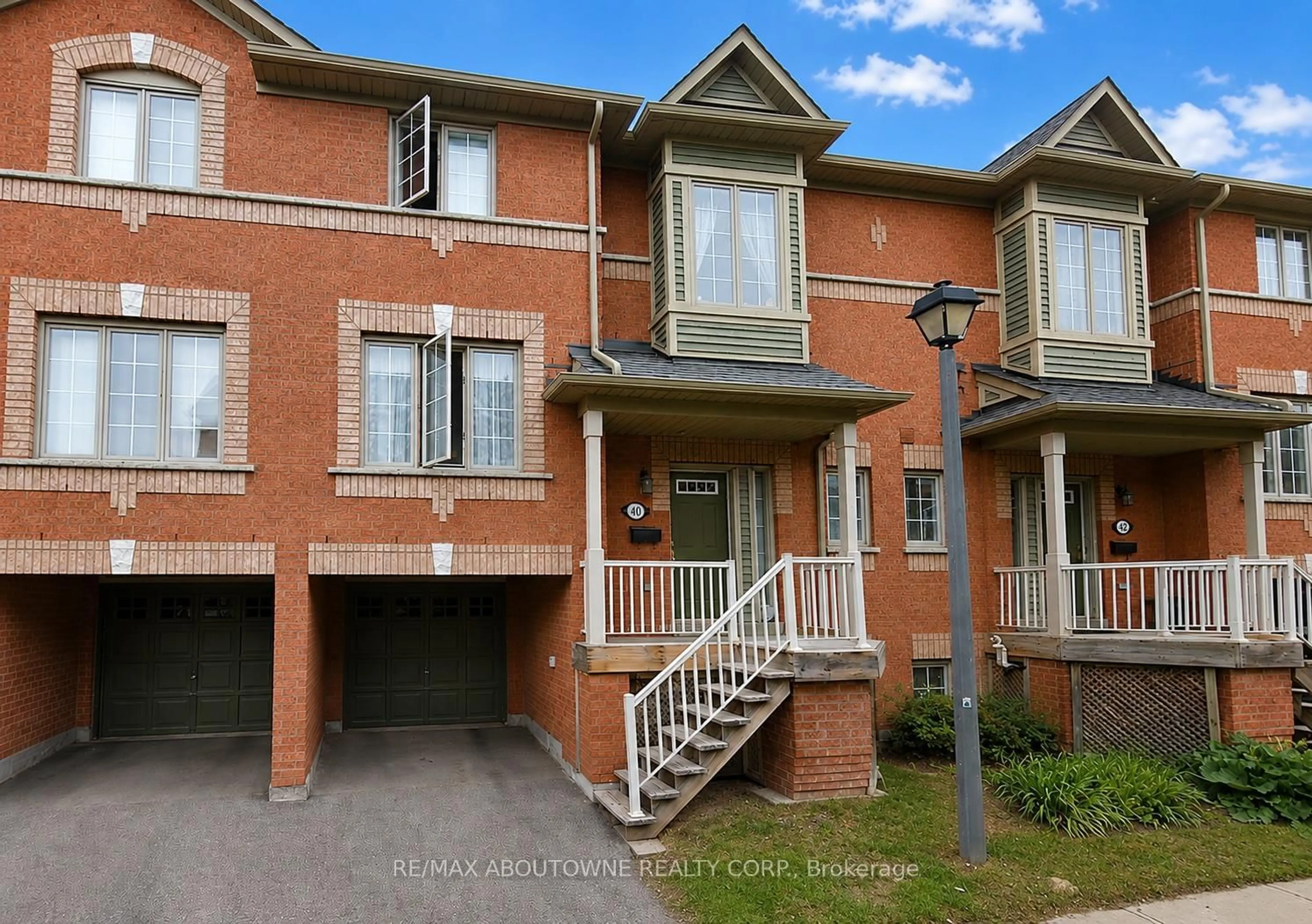 Home with brick exterior material, street for 5031 East Mill Rd #40, Mississauga Ontario L5V 2M5
