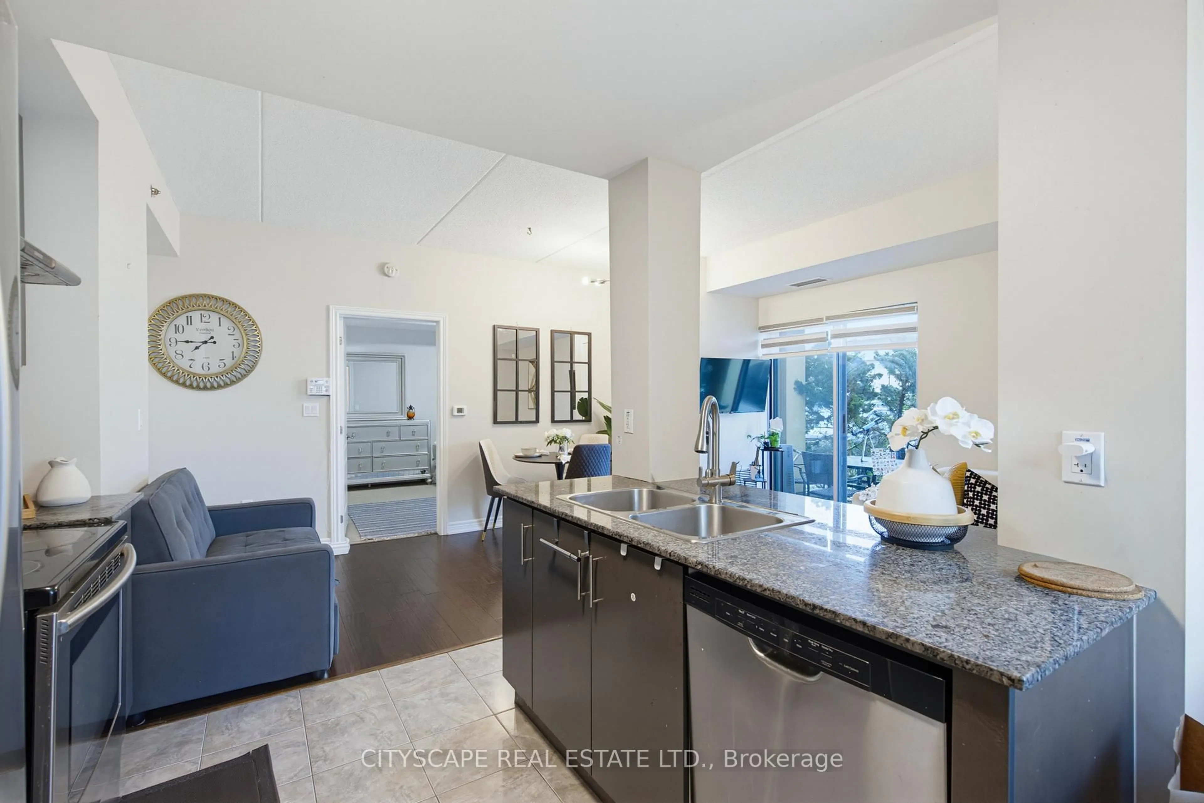 Open concept kitchen, ceramic/tile floor for 1419 Costigan Rd #103, Milton Ontario L9T 2L4