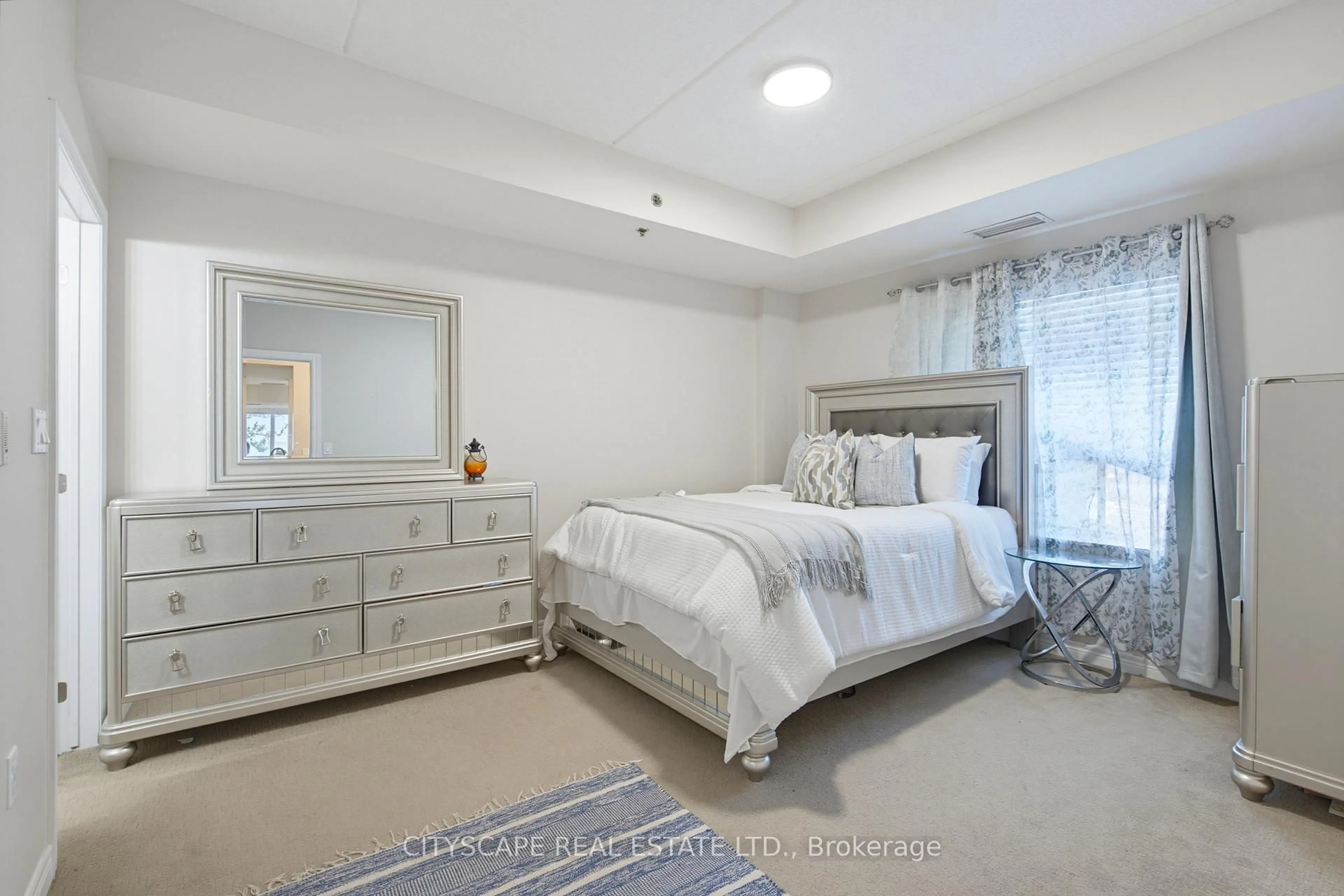 Bedroom with bed, unknown for 1419 Costigan Rd #103, Milton Ontario L9T 2L4