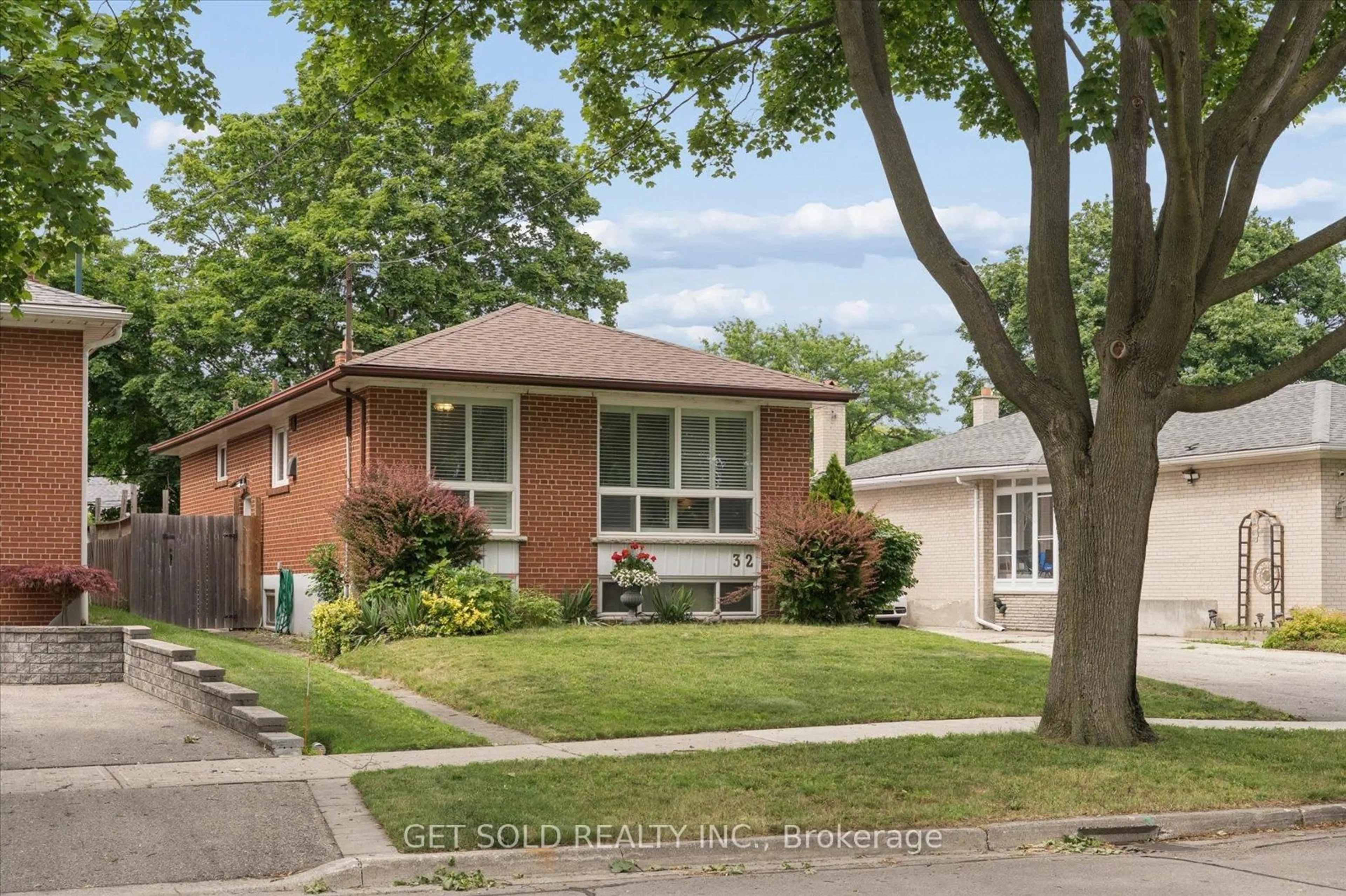 Home with brick exterior material, street for 32 Checkendon Dr, Toronto Ontario M9W 2Y9