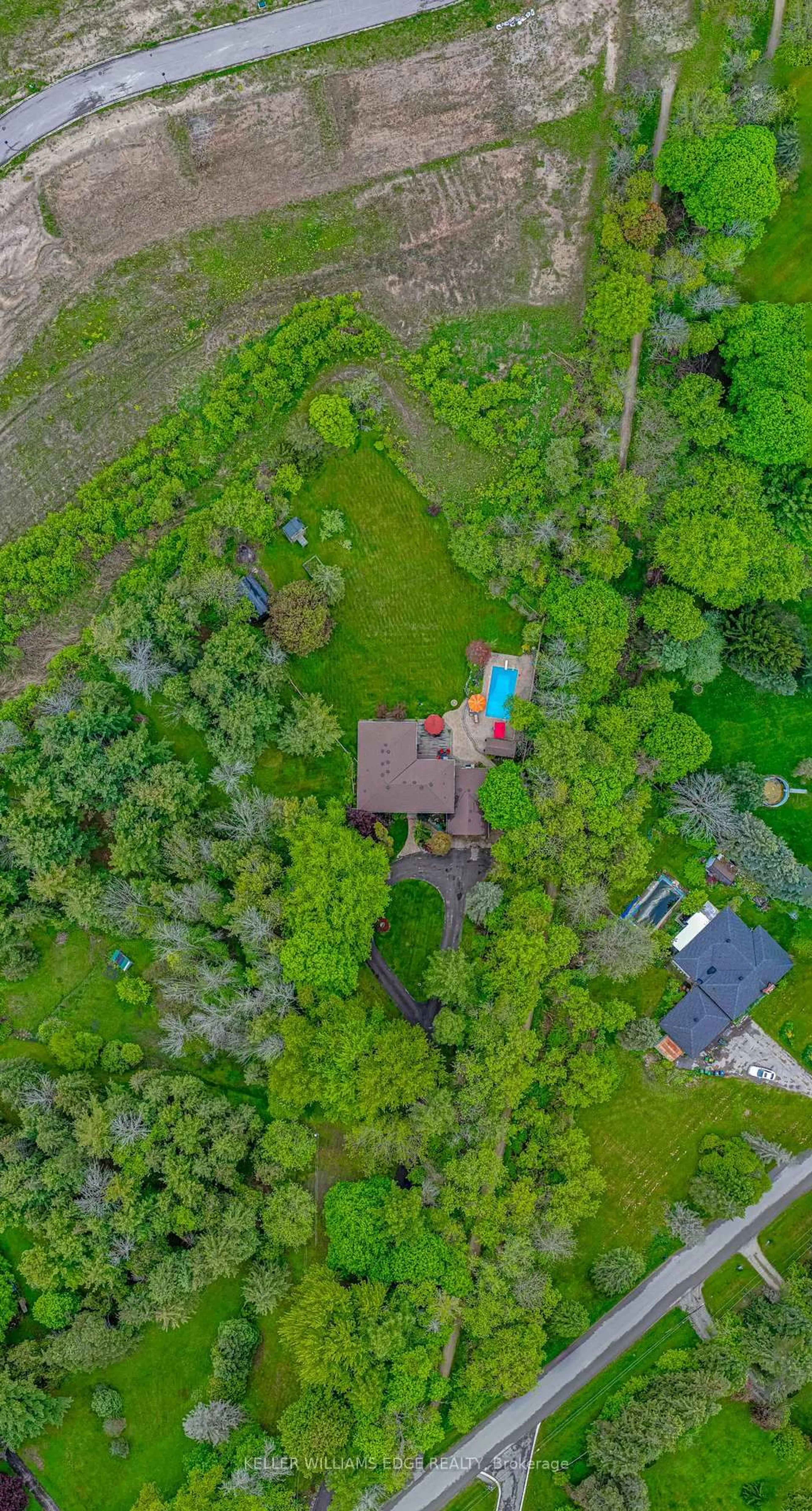 A pic from outside/outdoor area/front of a property/back of a property/a pic from drone, unknown for 57 Kennedy Rd, Caledon Ontario L7C 2M7