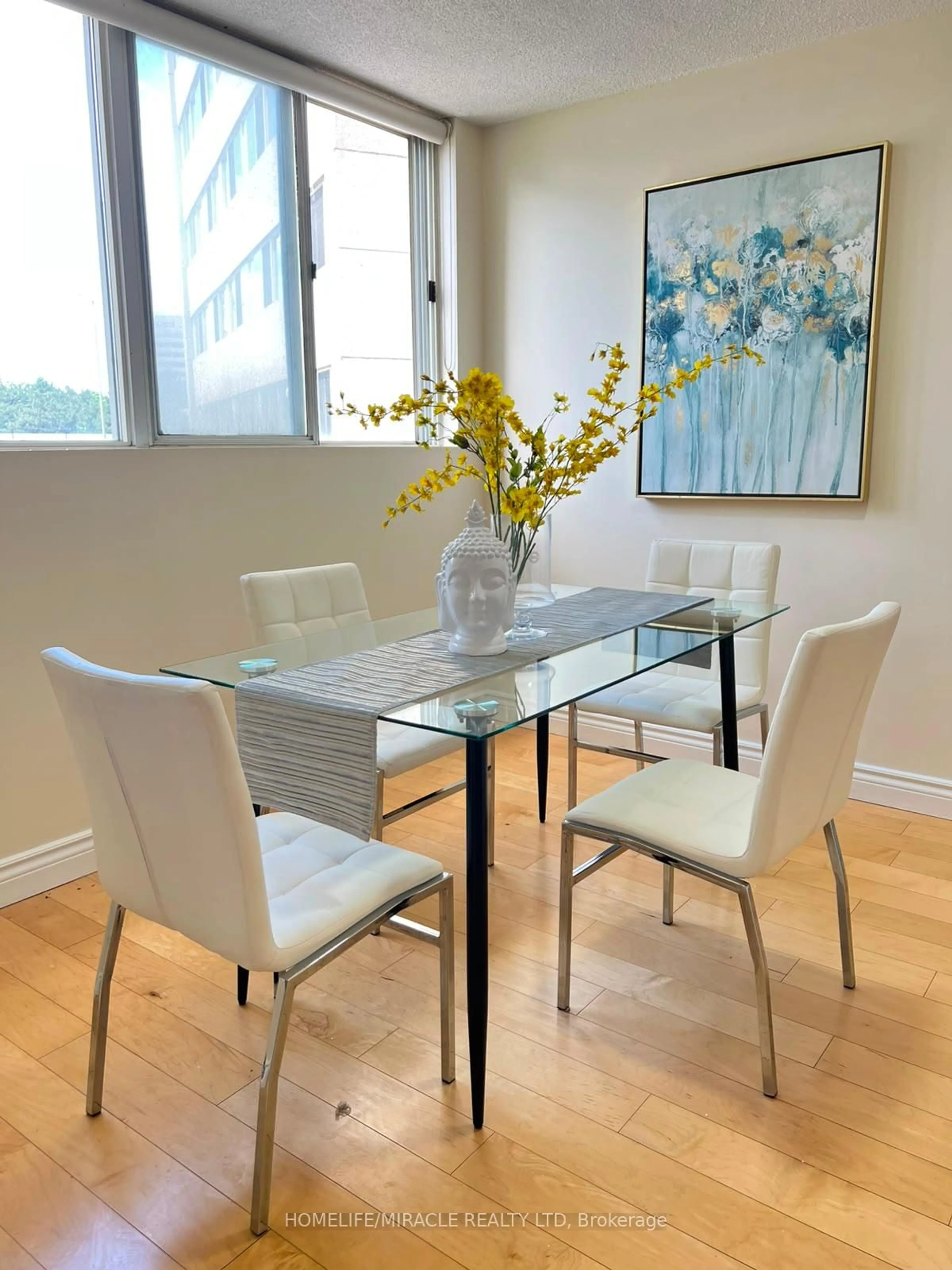 Dining room, wood/laminate floor for 3700 Kaneff Cres #202, Mississauga Ontario L5A 4B8
