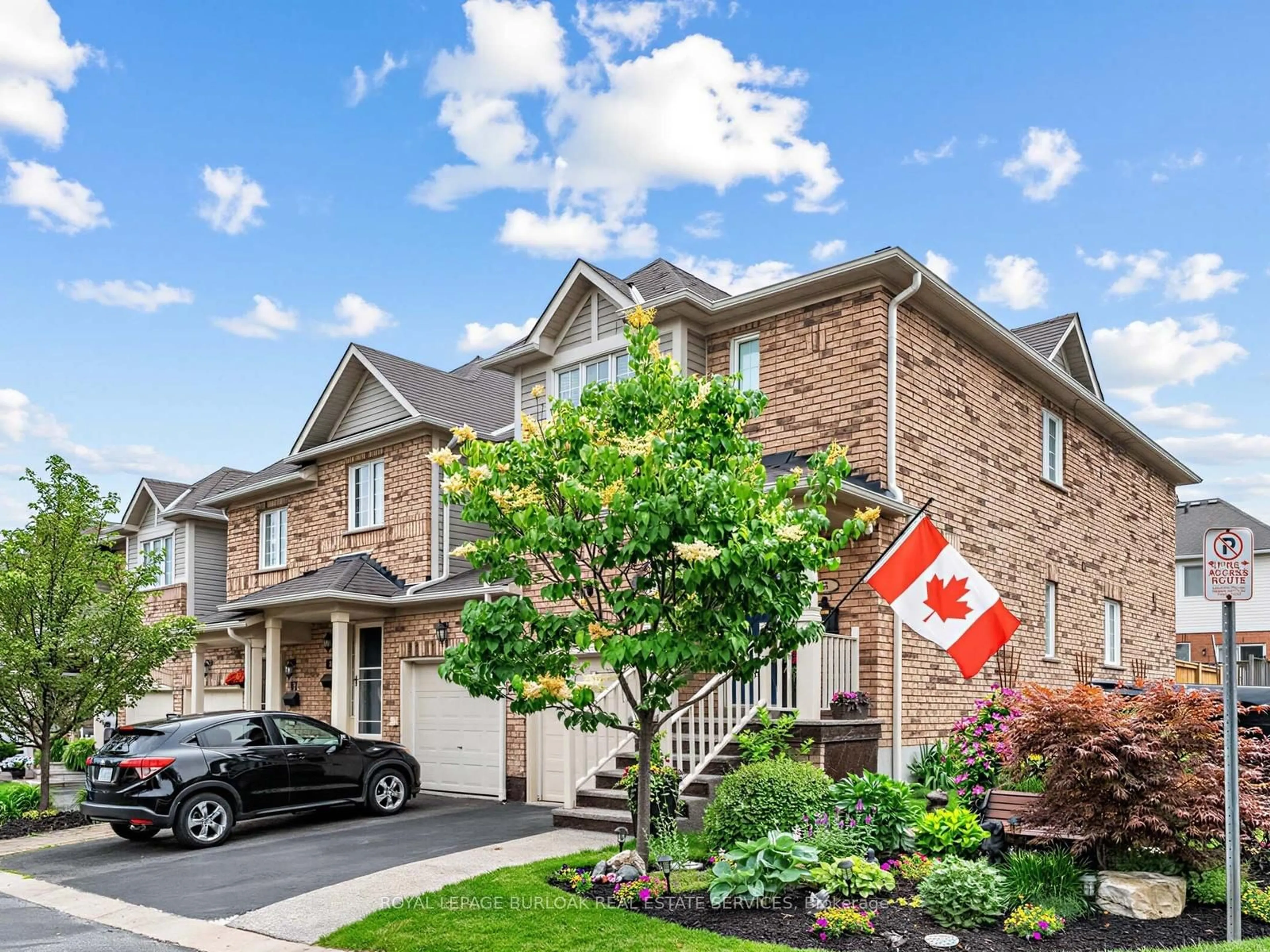 Home with brick exterior material, street for 710 Spring Gardens Rd #65, Burlington Ontario L7T 4K7