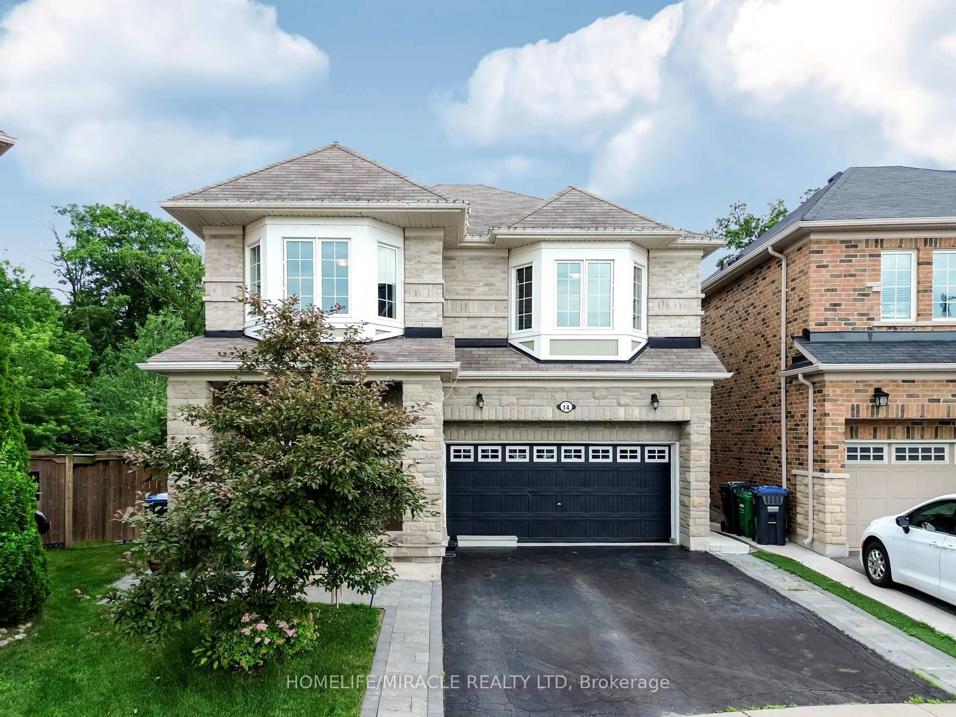 Home with brick exterior material, street for 14 Adeline Crt, Brampton Ontario L6Y 0W9