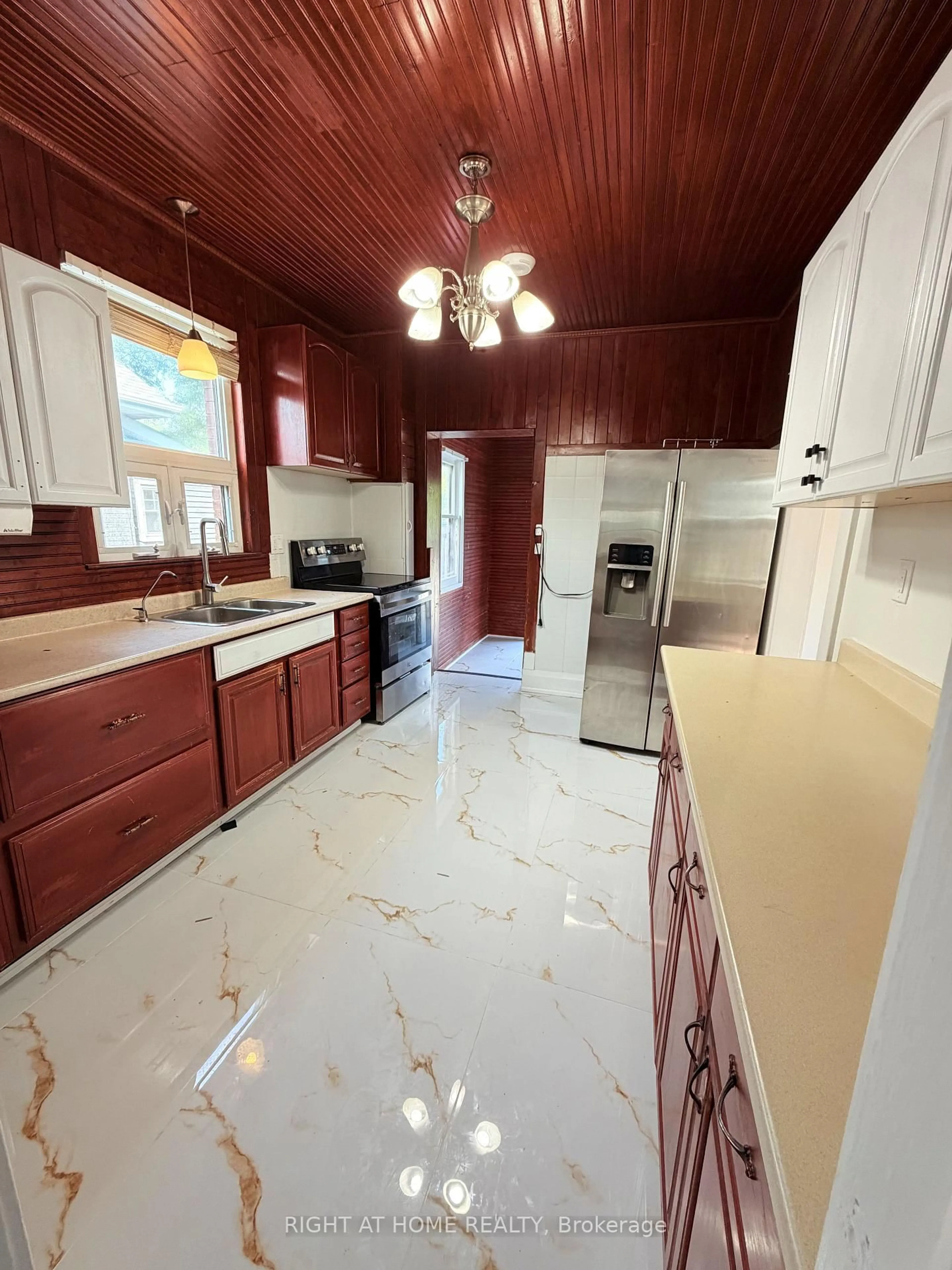 Open concept kitchen, ceramic/tile floor for 223 Queen St, Brampton Ontario L6Y 1M6