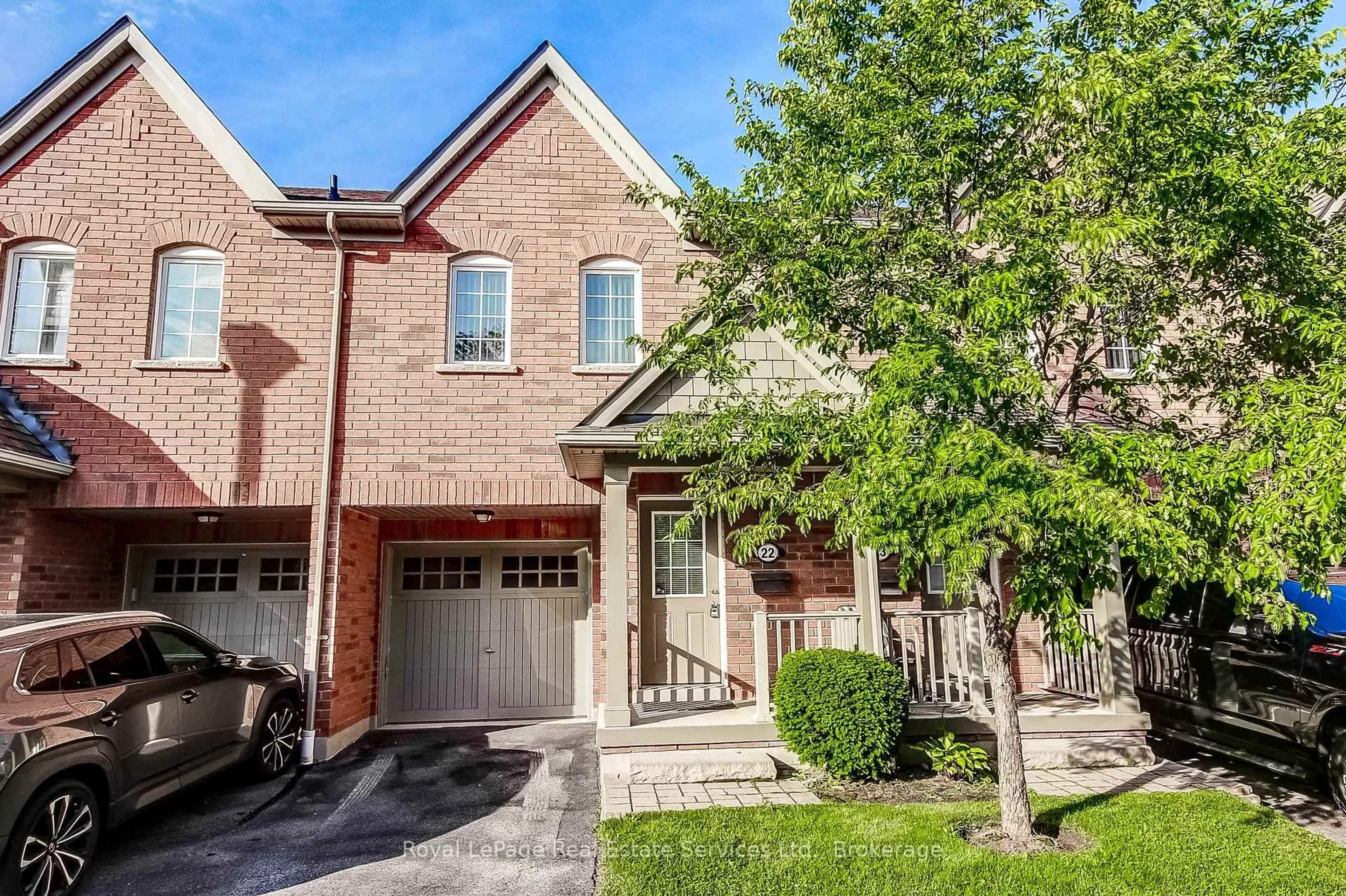 Home with brick exterior material, street for 233 Duskywing Way #22, Oakville Ontario L6L 0C5