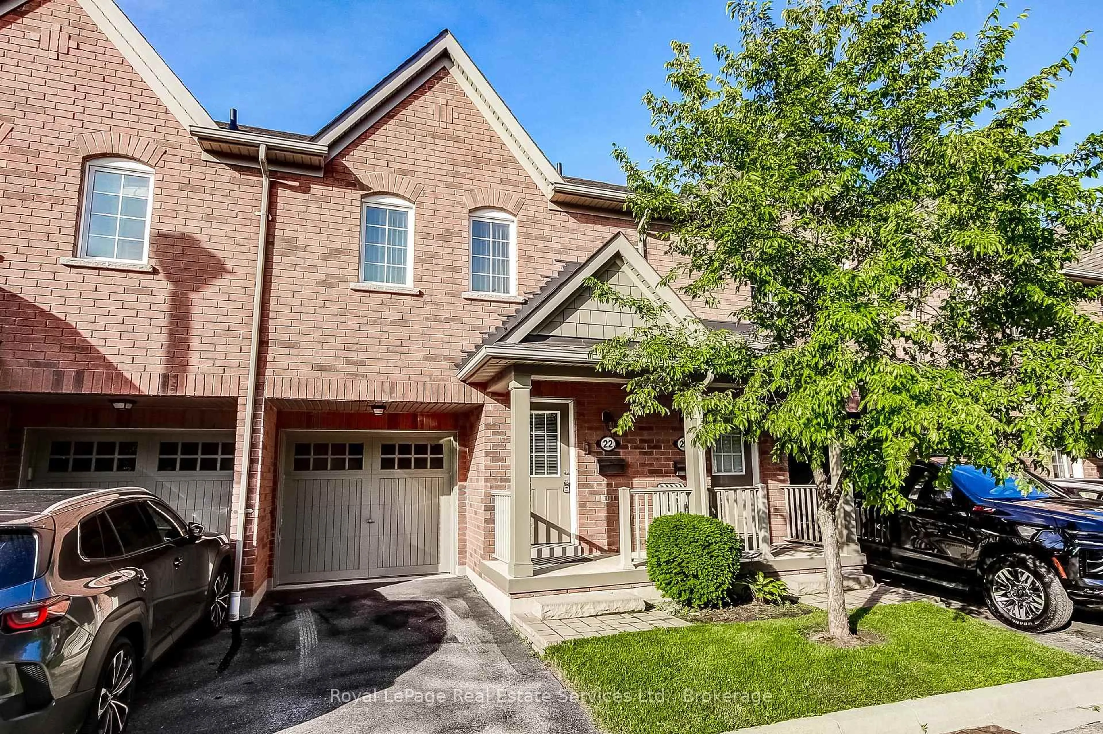 Home with brick exterior material, street for 233 Duskywing Way #22, Oakville Ontario L6L 0C5