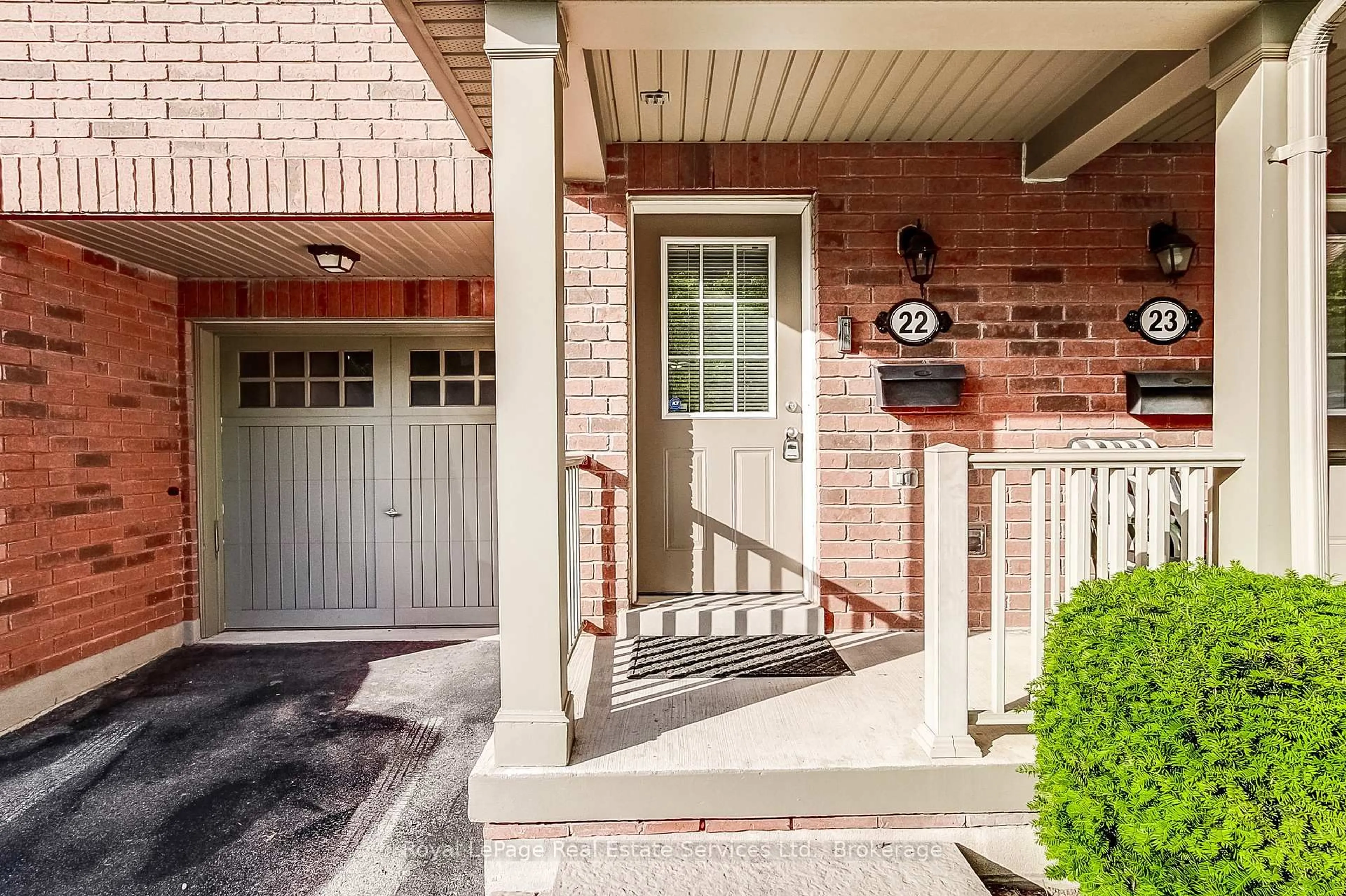 Home with brick exterior material, street for 233 Duskywing Way #22, Oakville Ontario L6L 0C5