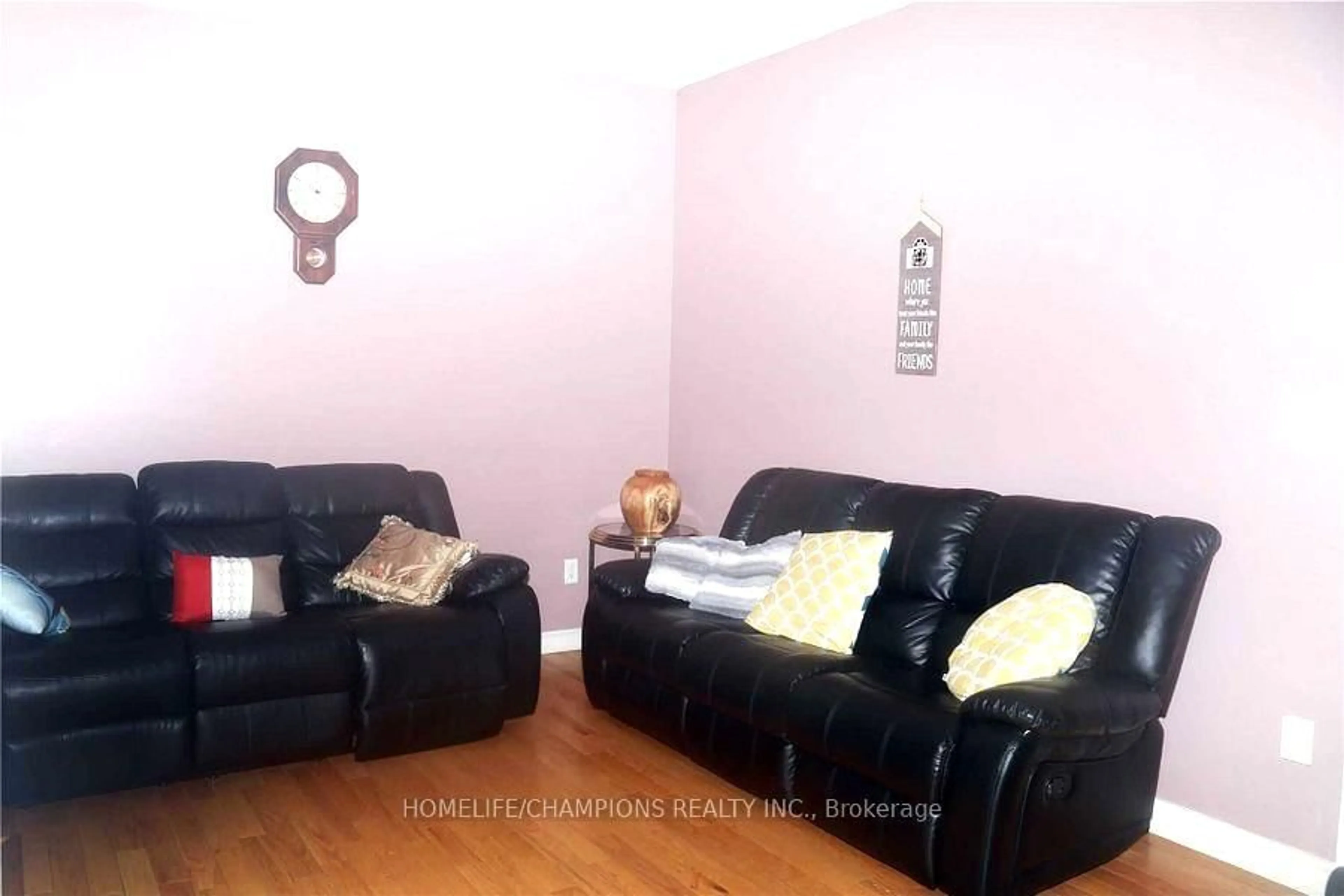 Living room with furniture, wood/laminate floor for 14 Benmore Cres, Brampton Ontario L6P 2S8