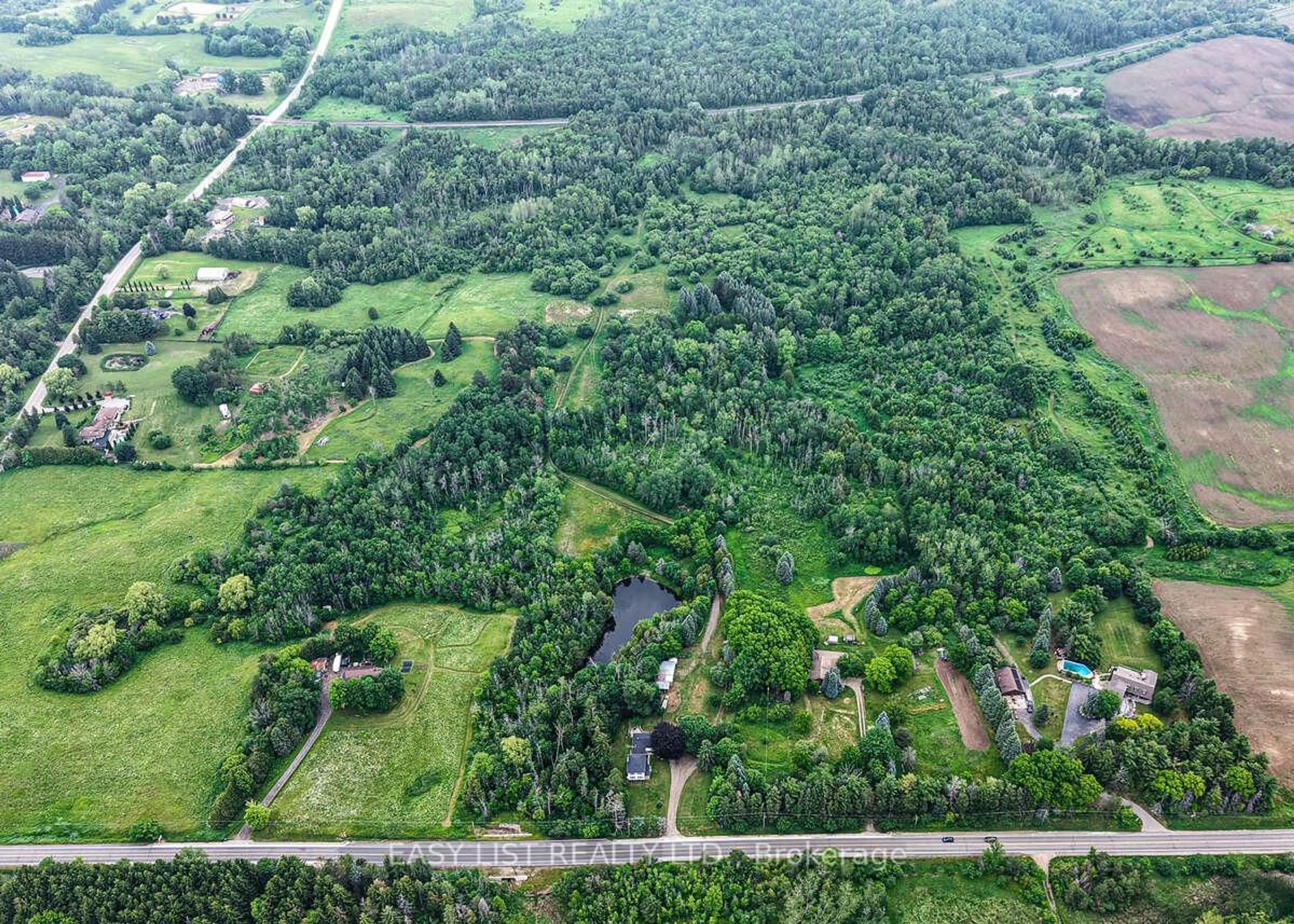 A pic from outside/outdoor area/front of a property/back of a property/a pic from drone, forest/trees view for 14877 The Gore Rd, Caledon Ontario L7E 0X1