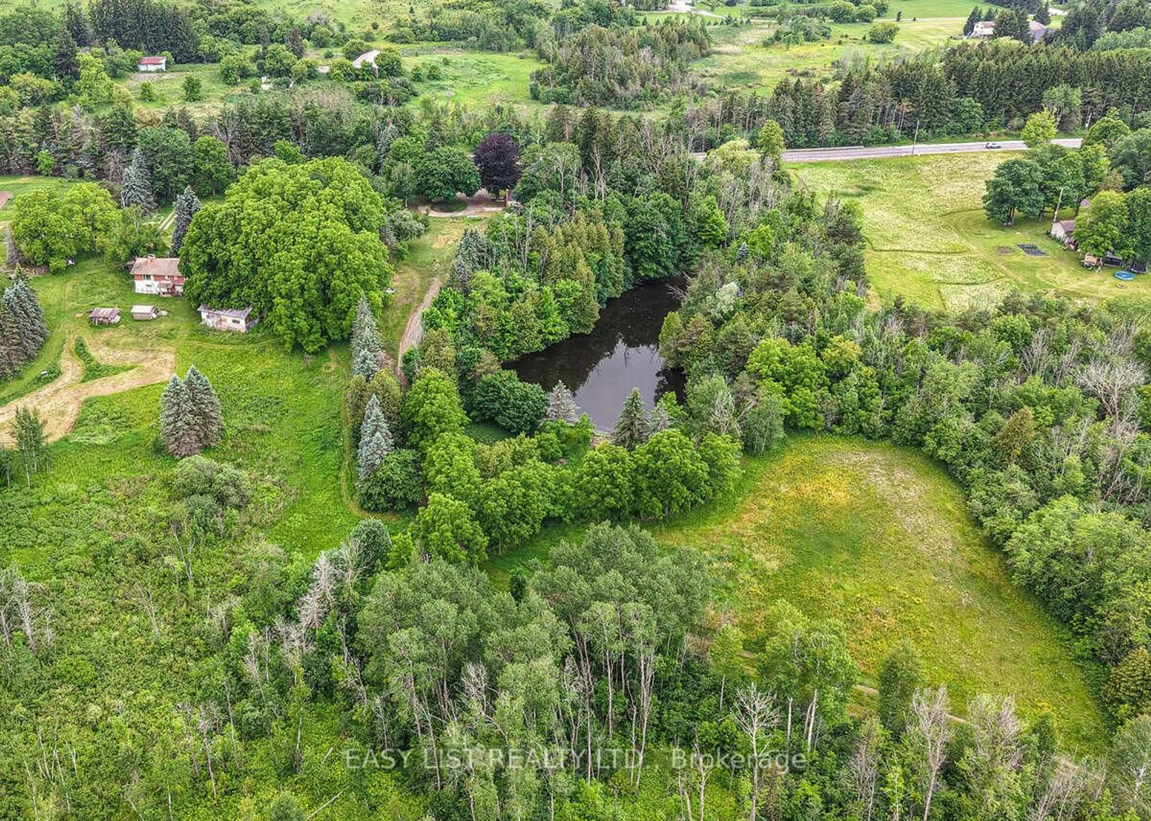 A pic from outside/outdoor area/front of a property/back of a property/a pic from drone, forest/trees view for 14877 The Gore Rd, Caledon Ontario L7E 0X1