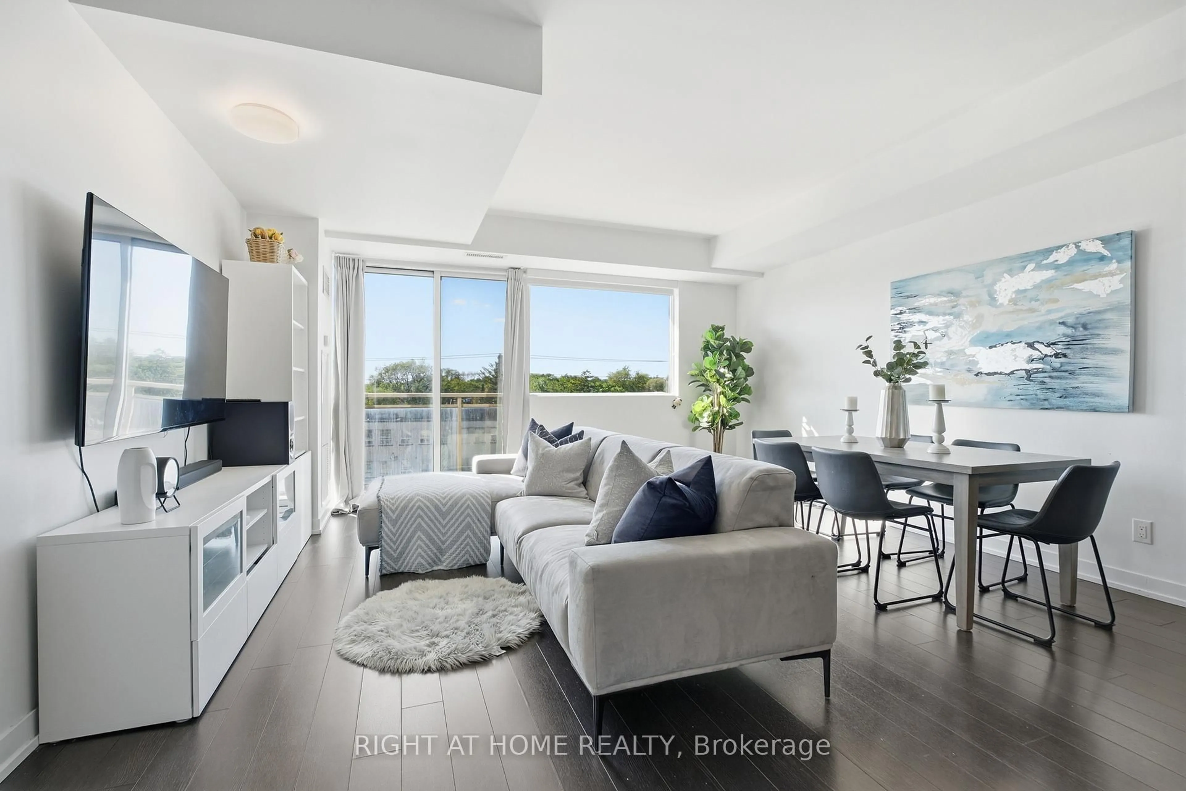Living room with furniture, unknown for 5101 Dundas St #411, Toronto Ontario M9A 5G8