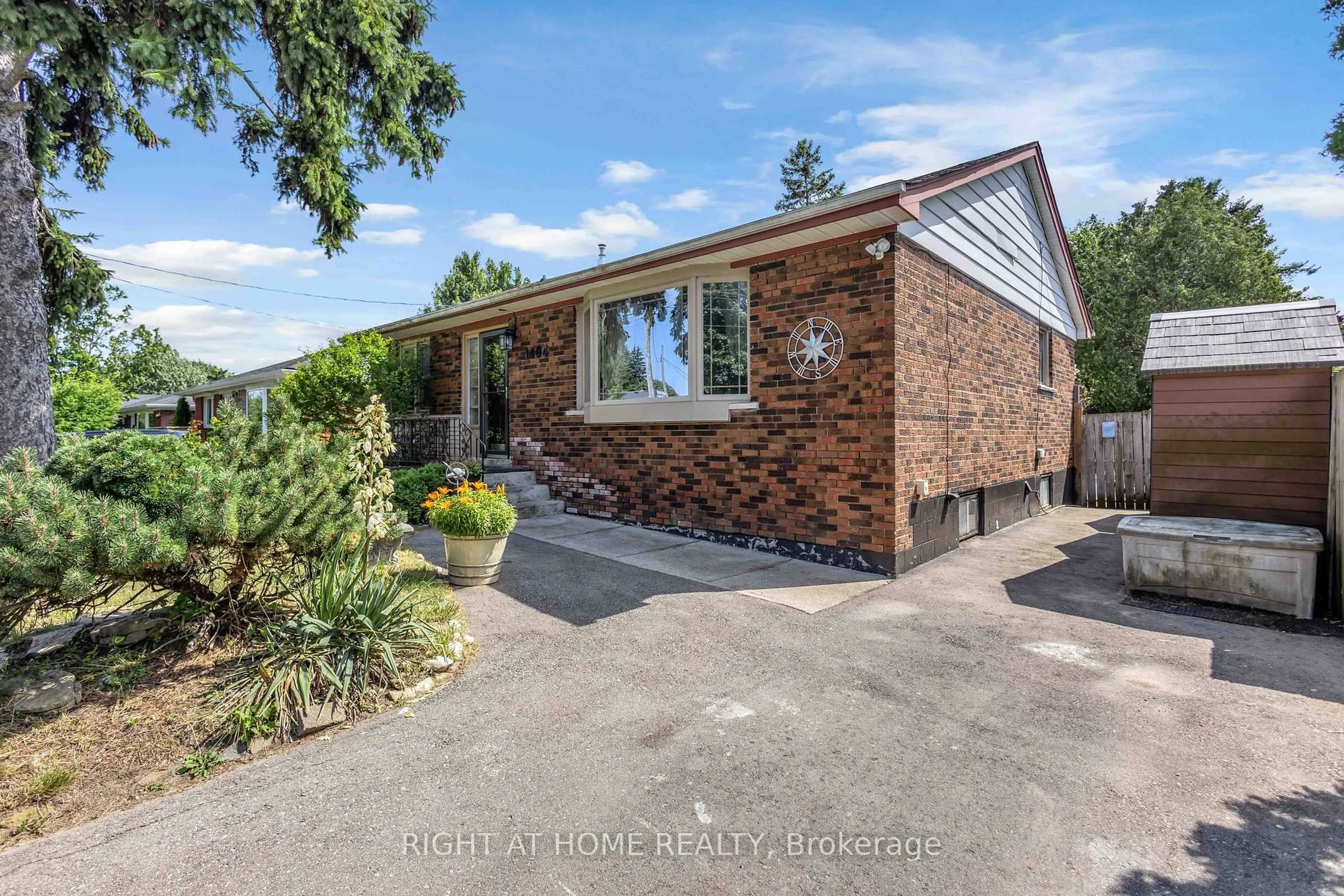 Home with brick exterior material, street for 1404 Bunnell Dr, Burlington Ontario L7P 2E1