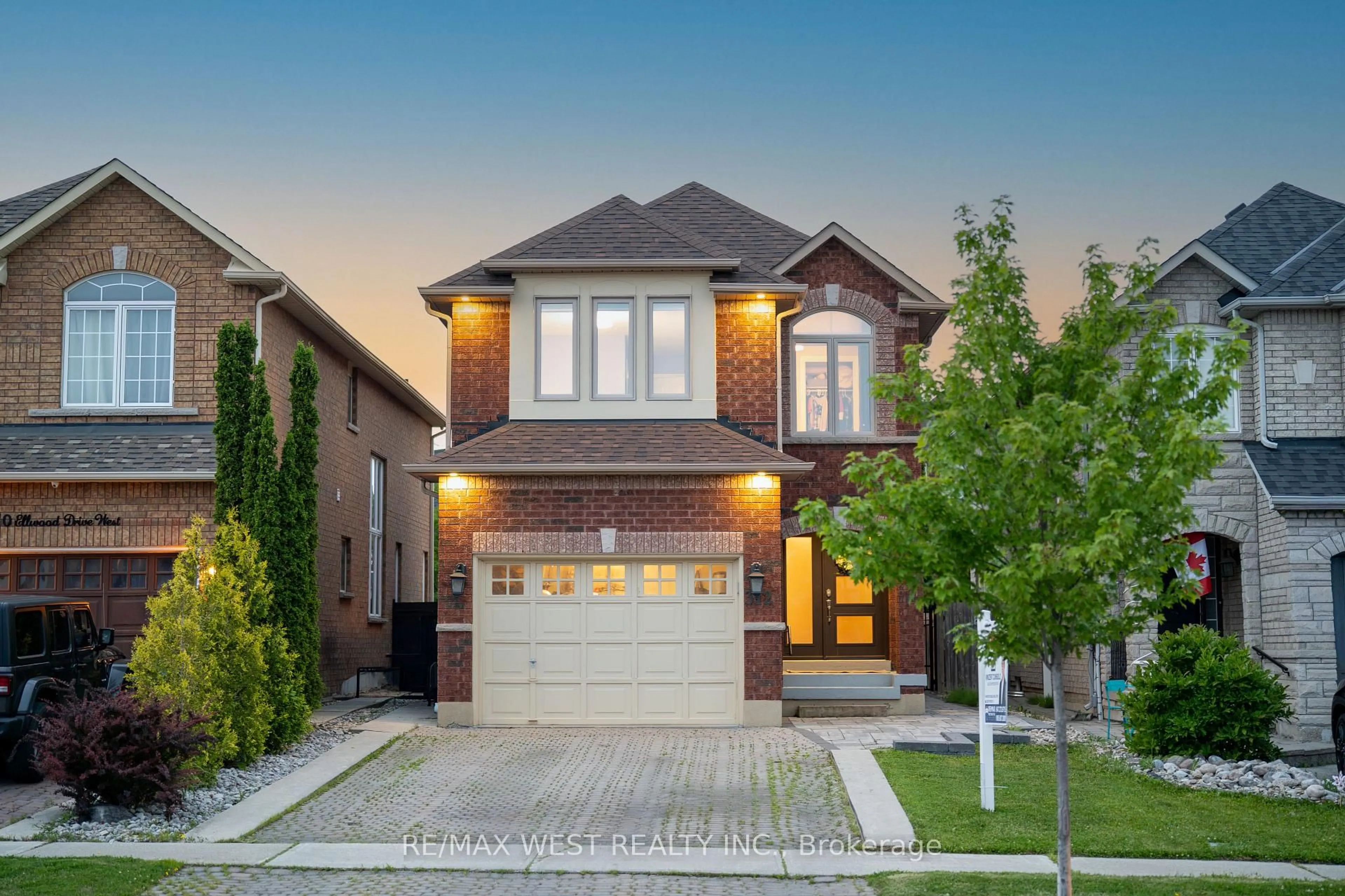 Home with brick exterior material, street for 312 Ellwood Dr, Caledon Ontario L7E 2G9
