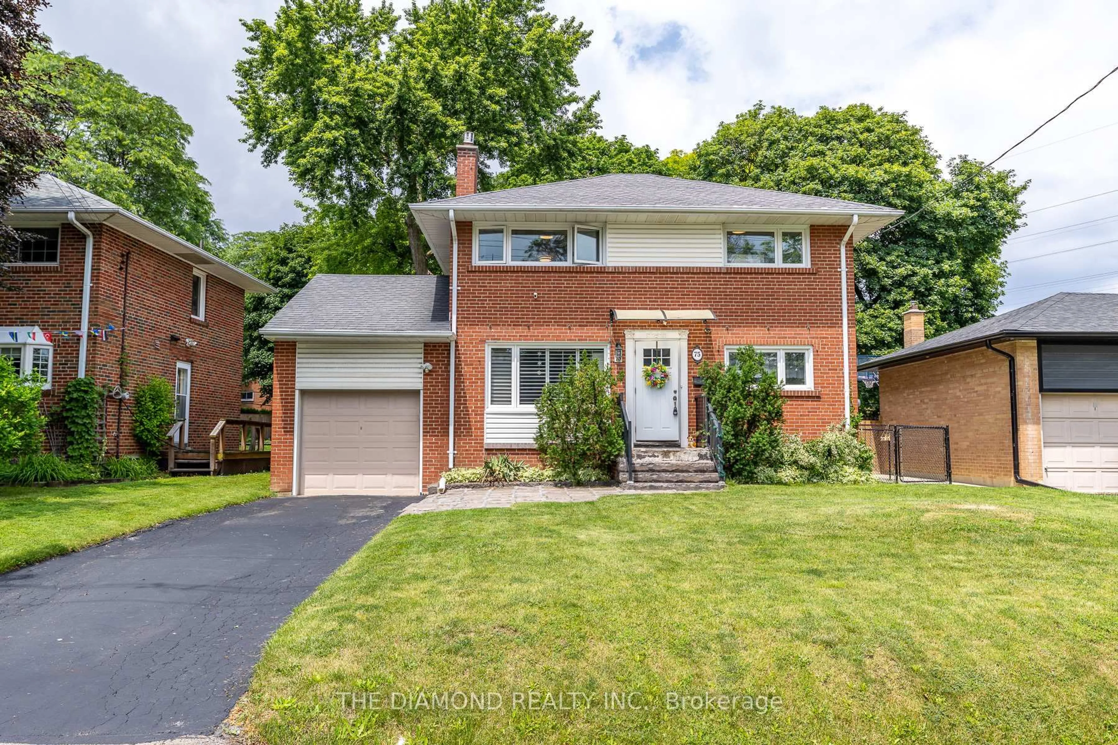 Home with brick exterior material, street for 75 Glen Agar Dr, Toronto Ontario M9B 5M2