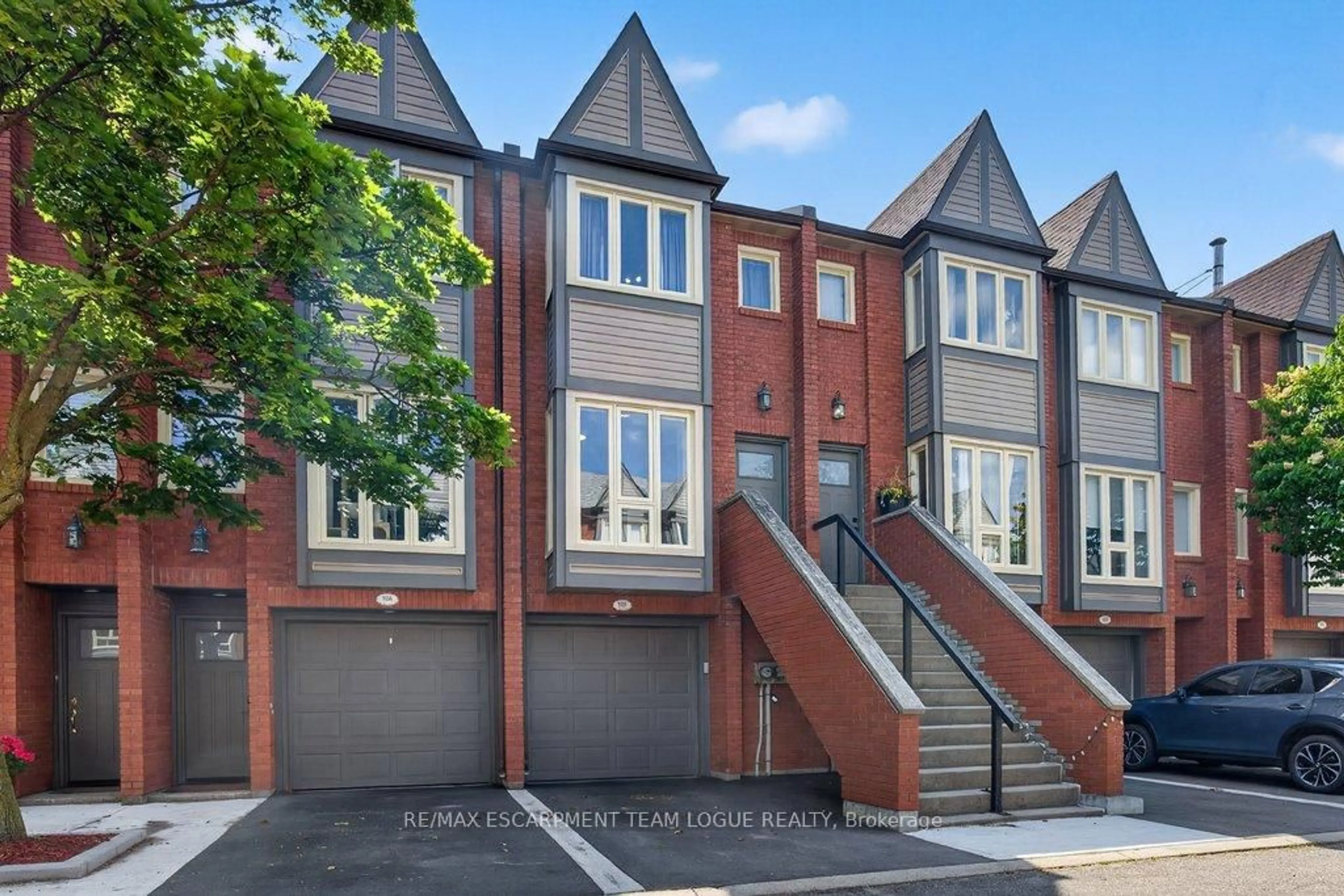 Home with brick exterior material, street for 895 MAPLE Ave #105, Burlington Ontario L7S 2H7
