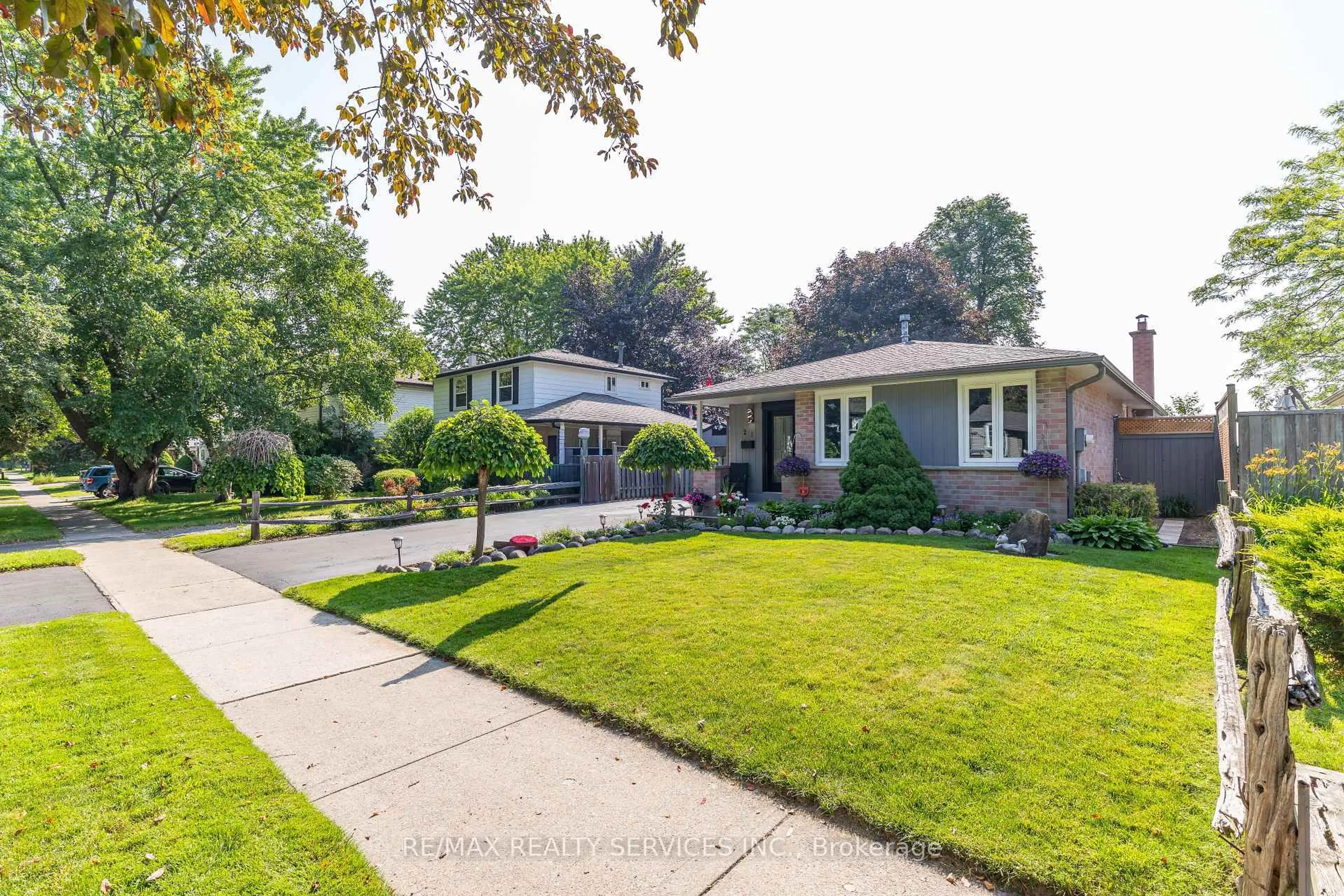 Home with brick exterior material, street for 21 Herkley Dr, Brampton Ontario L6V 2E7