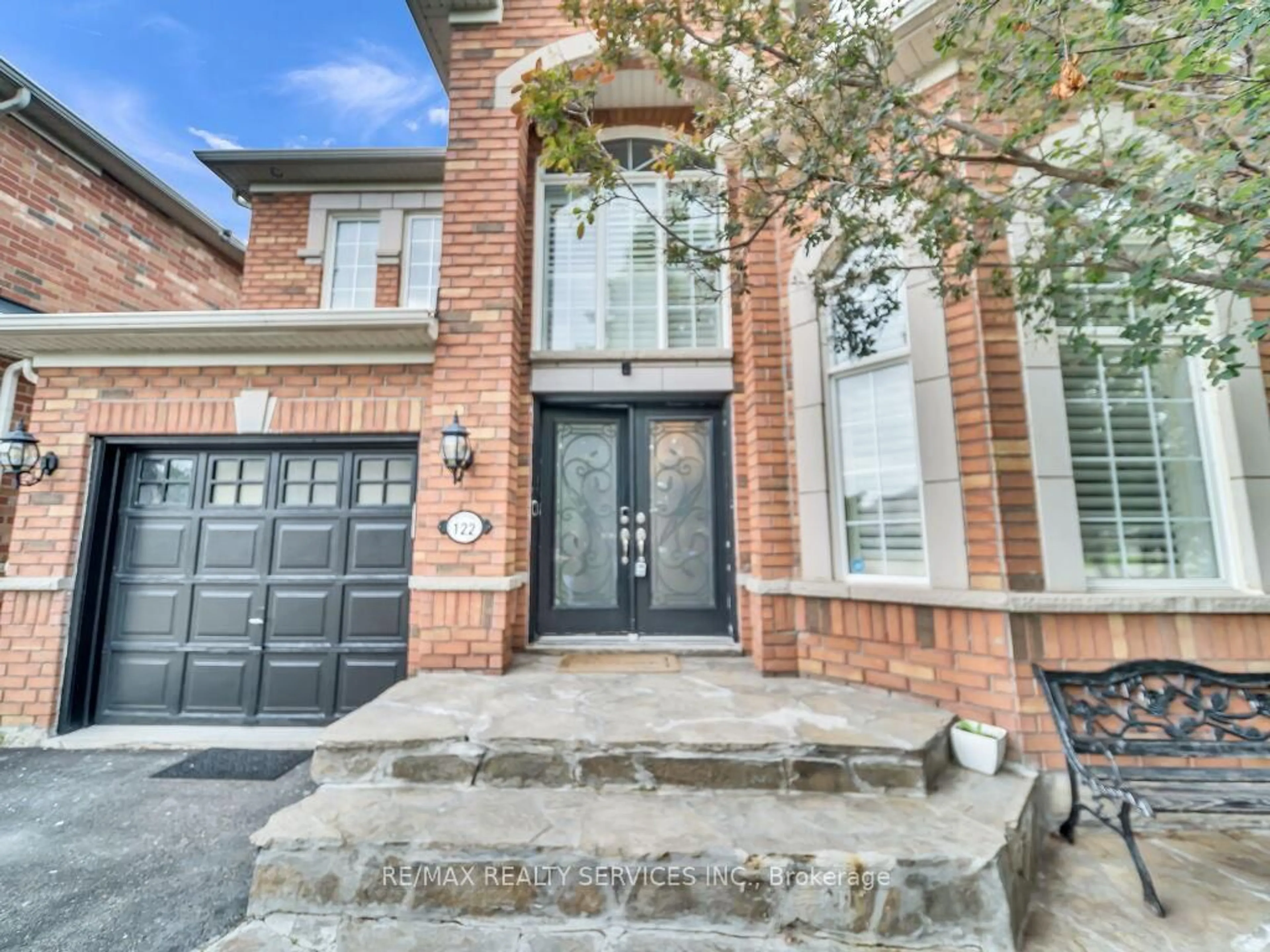 Home with brick exterior material, street for 122 Dells Cres, Brampton Ontario L7A 2X1