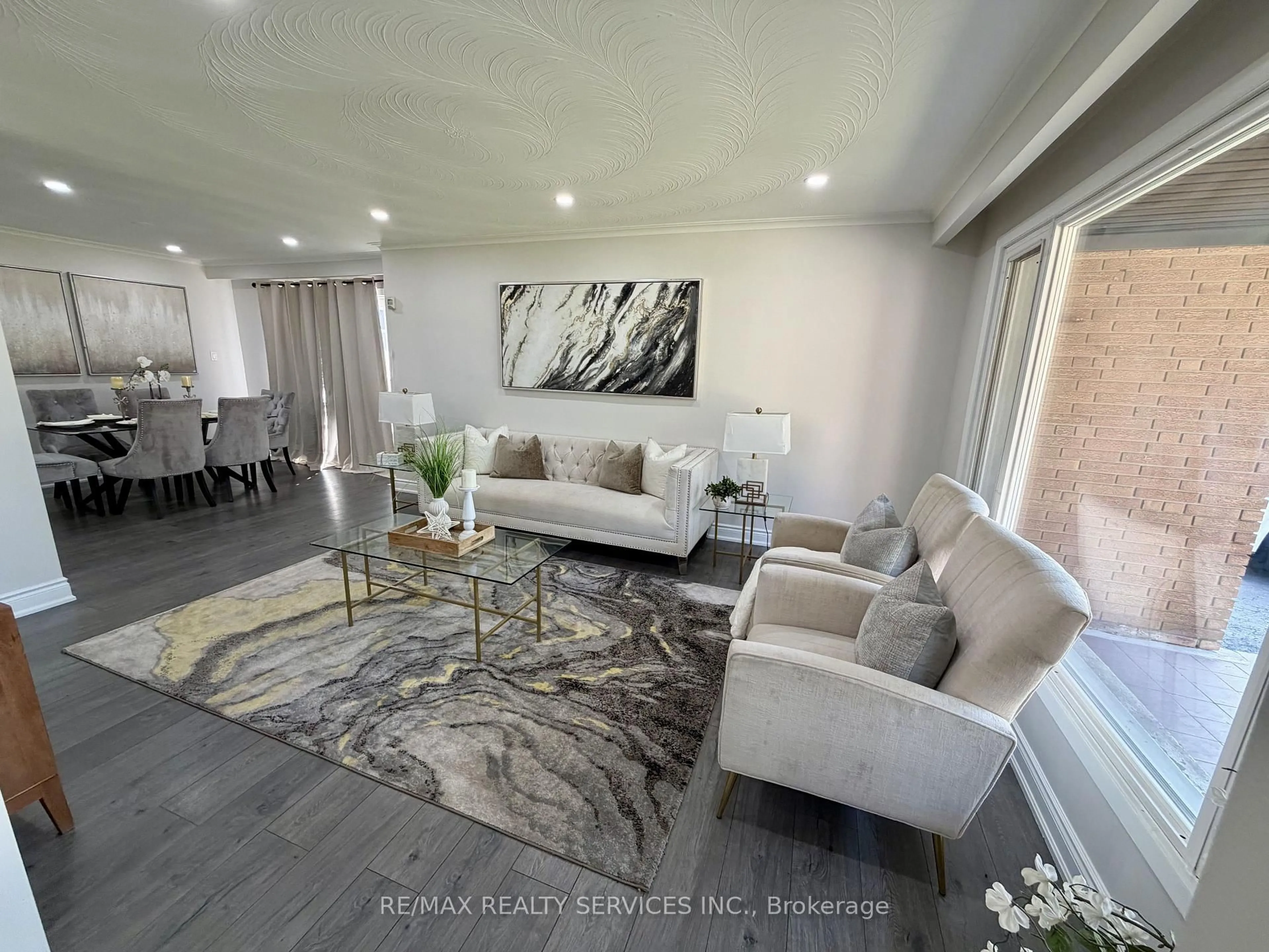 Living room with furniture, unknown for 7493 Netherwood Rd, Mississauga Ontario L4T 2N7
