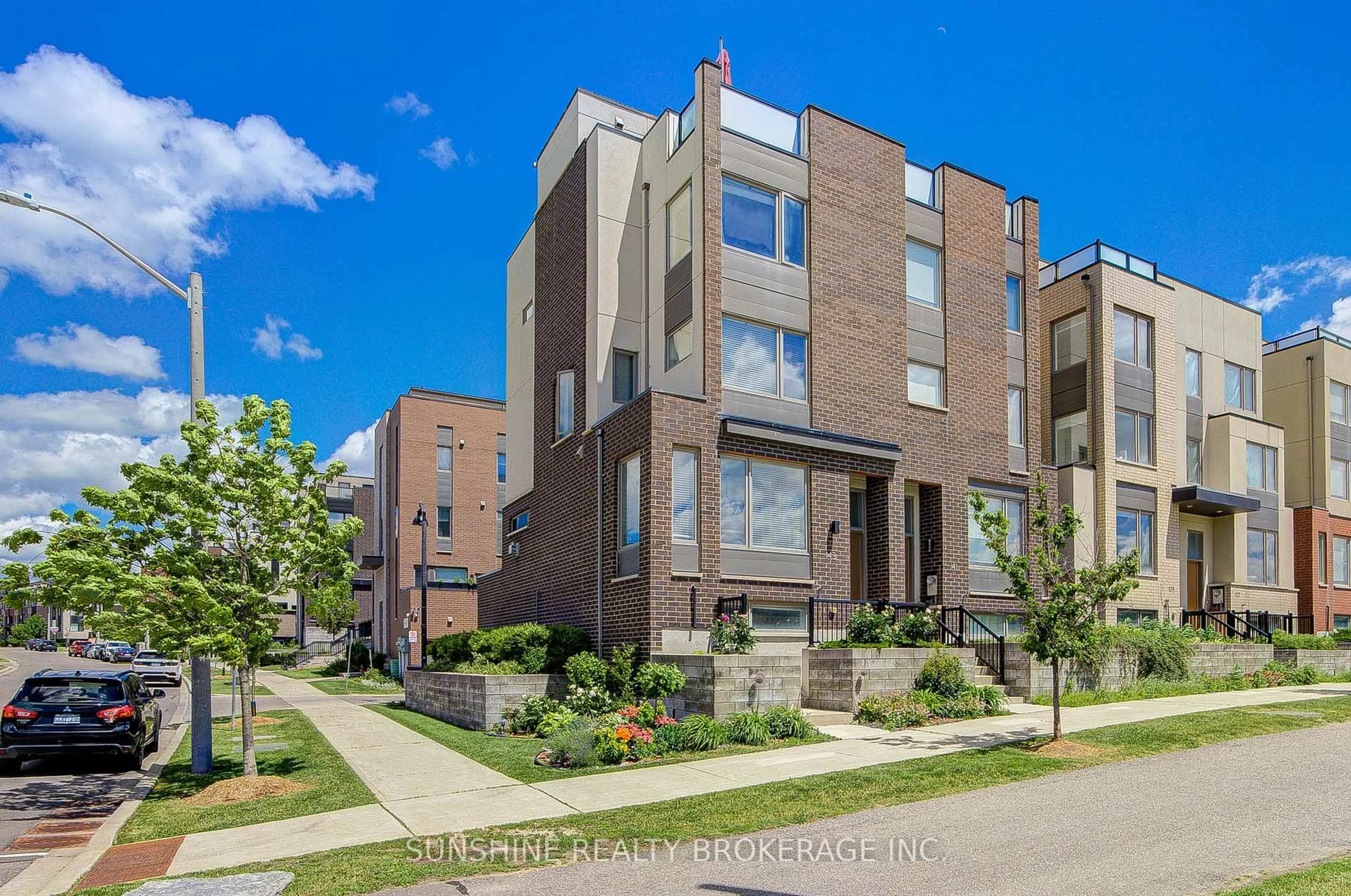 Home with brick exterior material, street for 143 Stanley Greene Blvd, Toronto Ontario M3K 0A5
