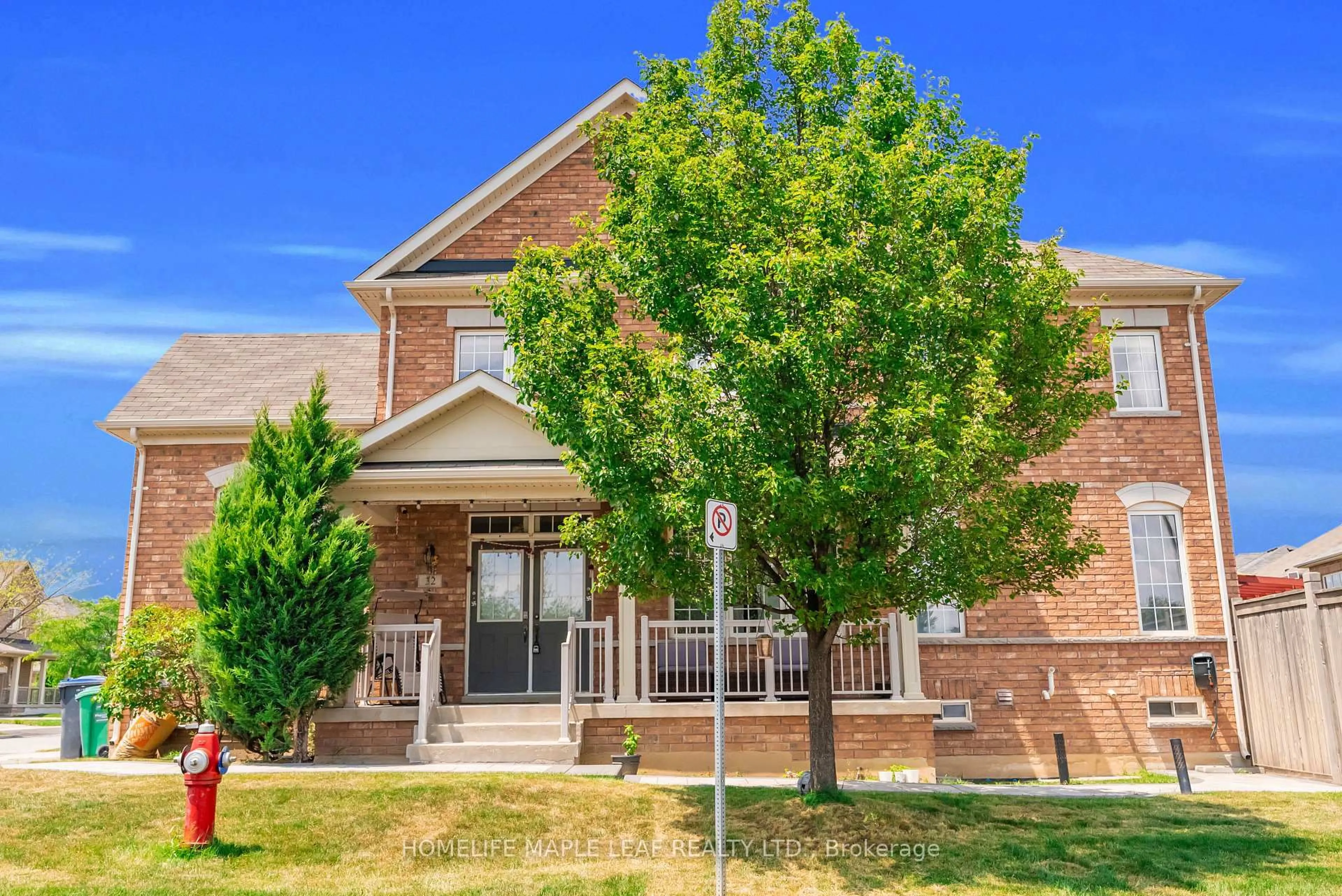Home with brick exterior material, street for 32 Orangeblossom Tr, Brampton Ontario L6X 3B4