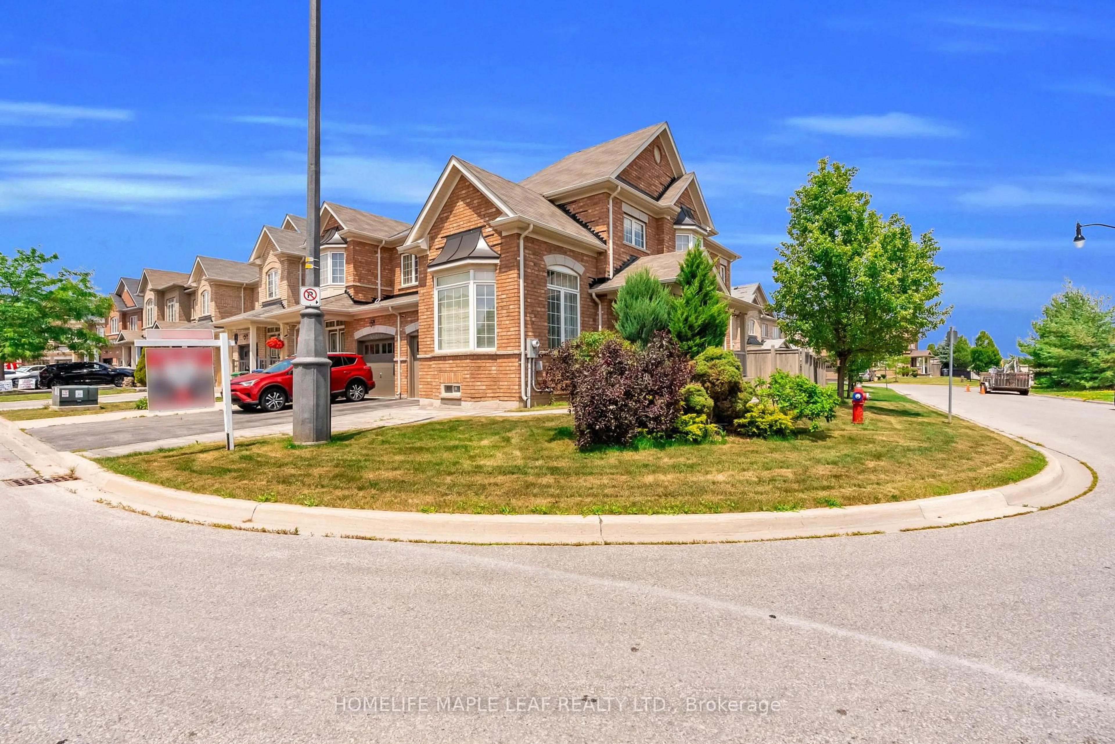 Home with brick exterior material, street for 32 Orangeblossom Tr, Brampton Ontario L6X 3B4