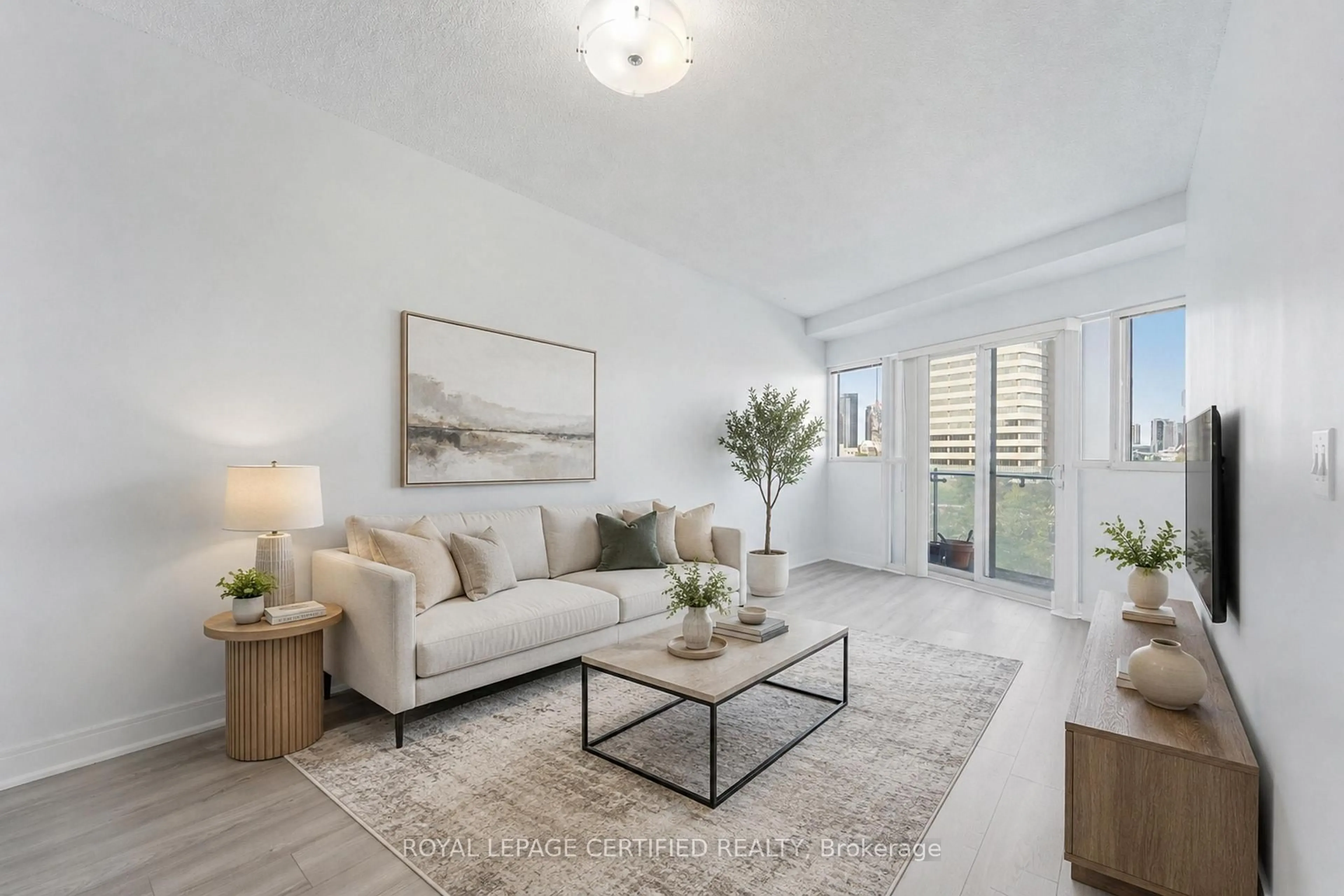 Living room with furniture, unknown for 50 Absolute Ave #609, Mississauga Ontario L4Z 0A8