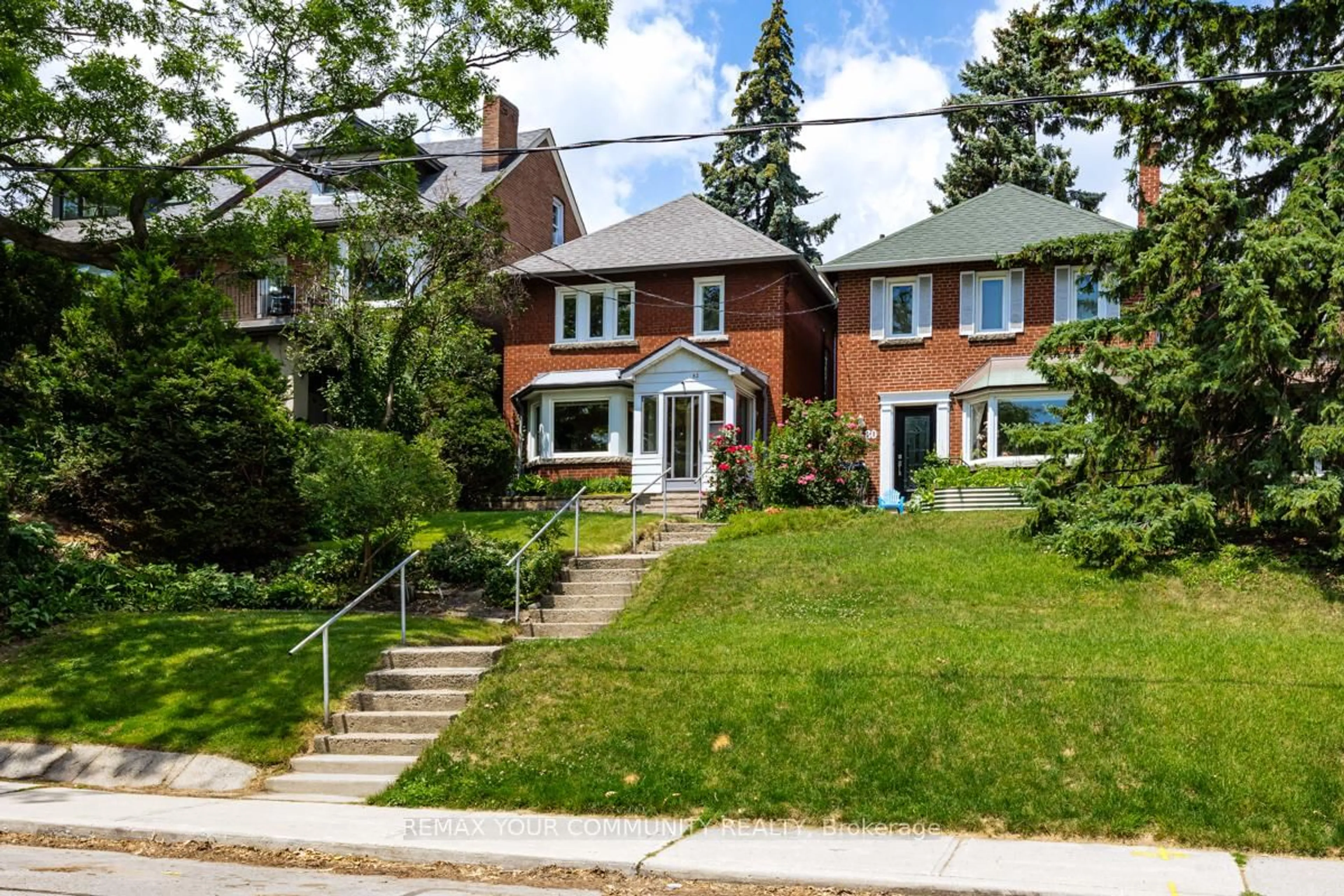 Home with brick exterior material, street for 82 Abbott Ave, Toronto Ontario M6P 1H6