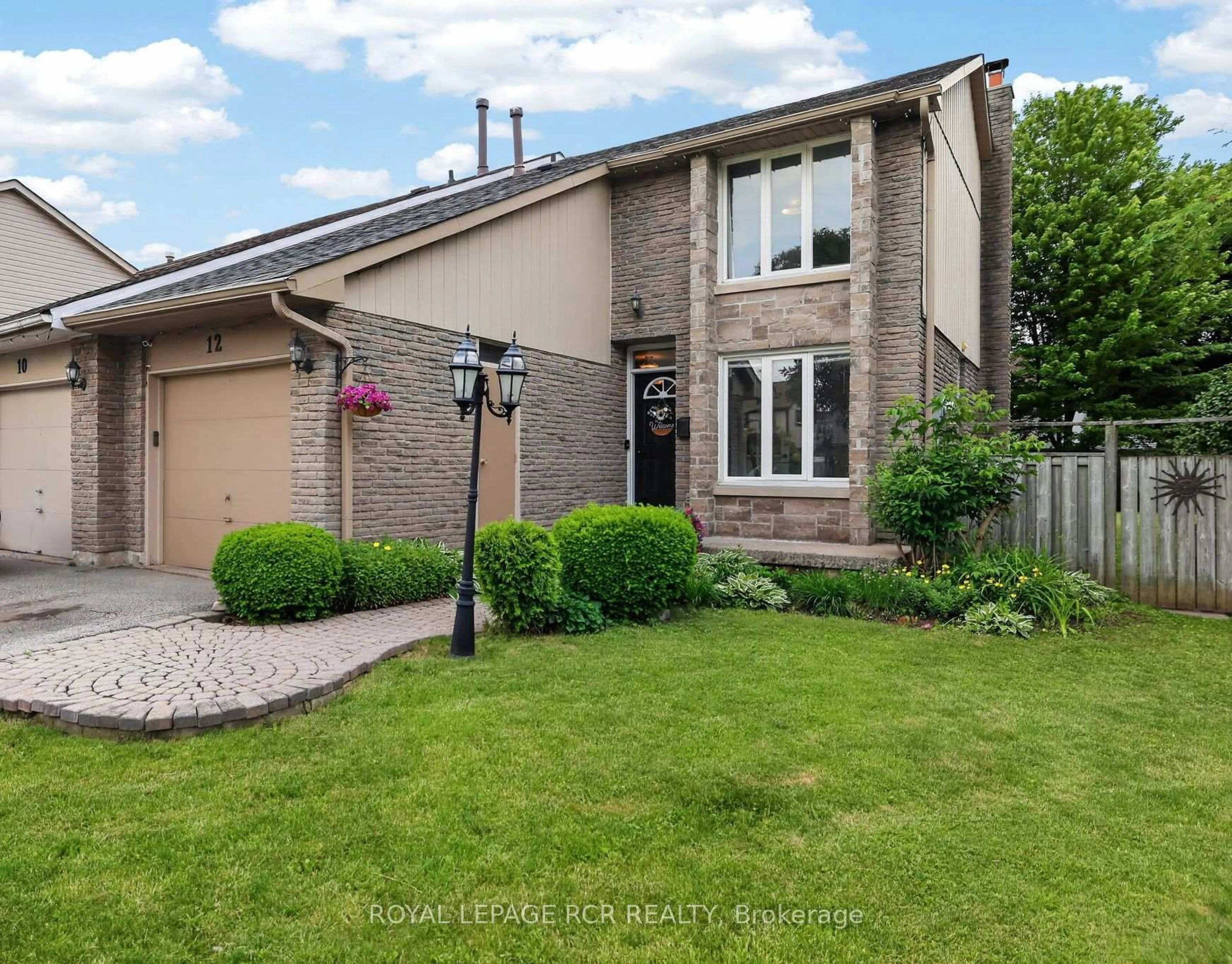 Home with brick exterior material, street for 12 Macassa Crt, Brampton Ontario L6Z 1B3
