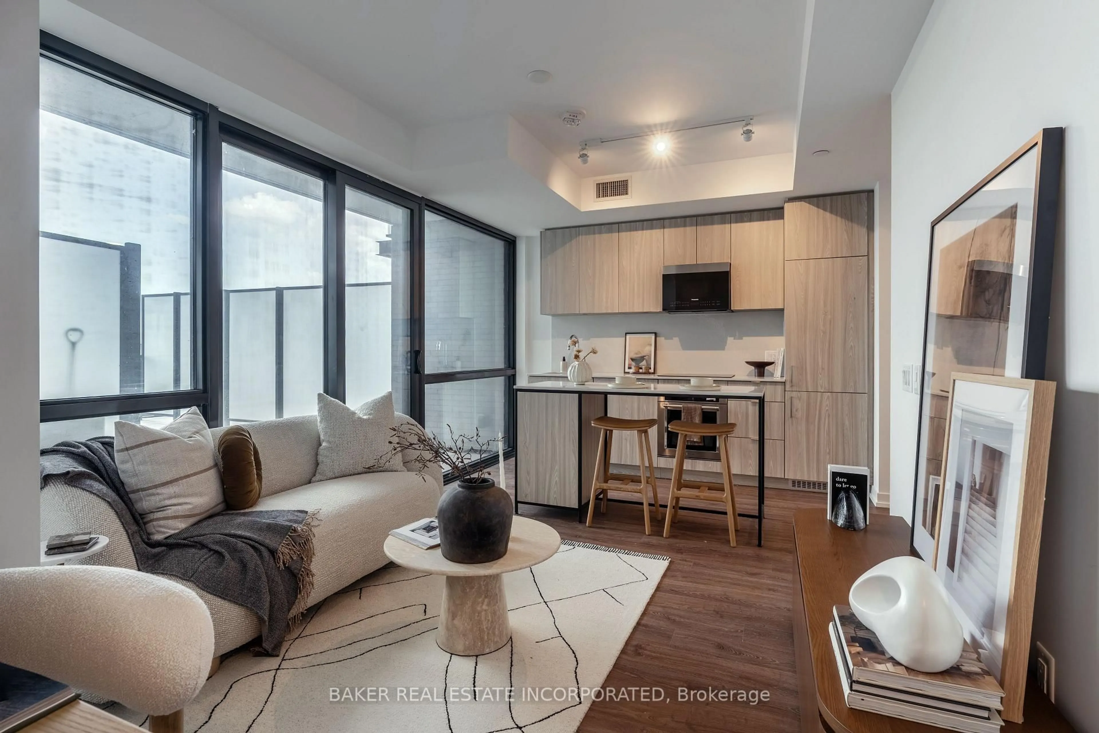 Living room with furniture, unknown for 251 Masonry Way #201, Mississauga Ontario L5H 0B3