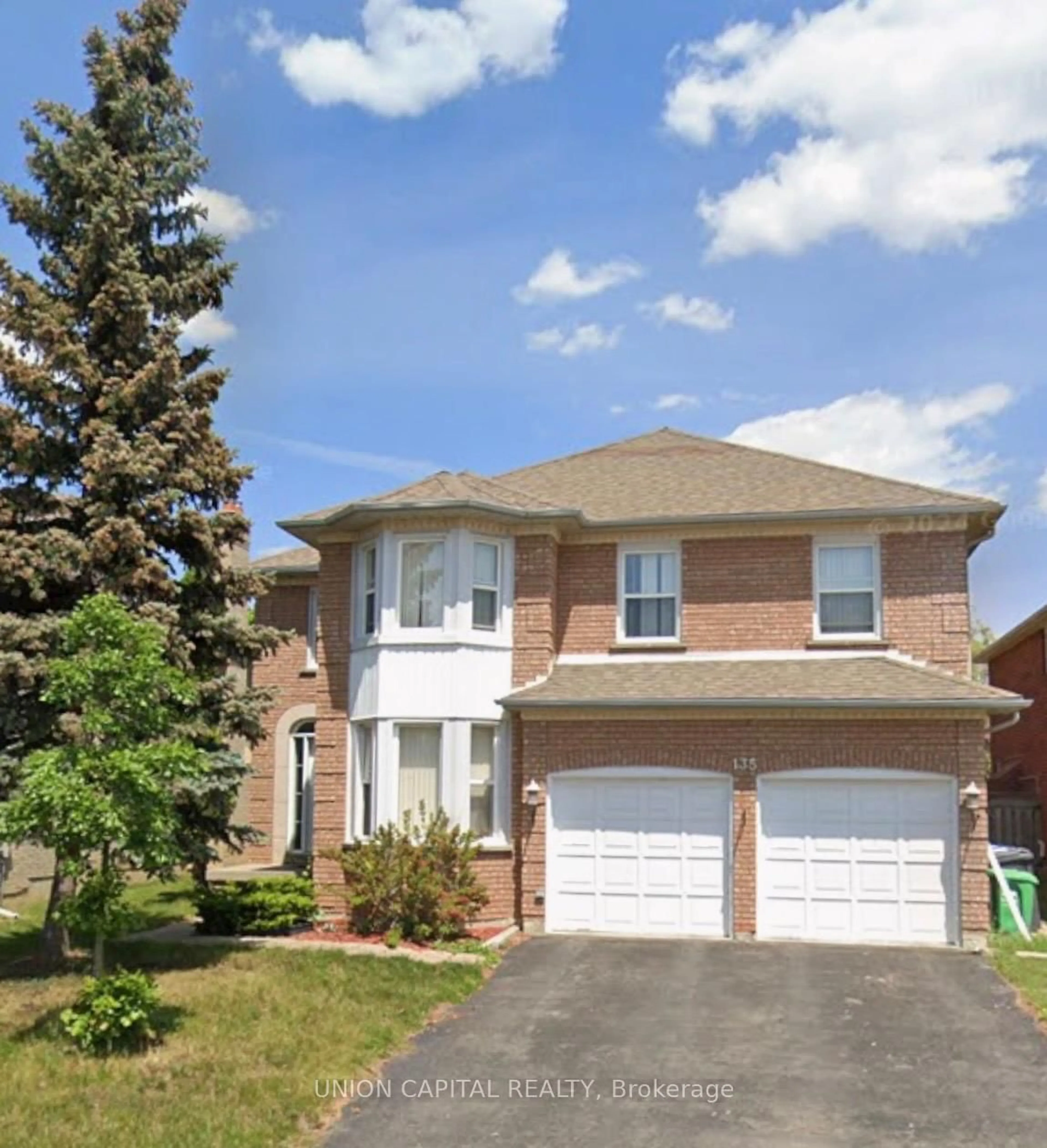 Home with brick exterior material, street for 135 Mountainash Rd, Brampton Ontario L6R 1H8