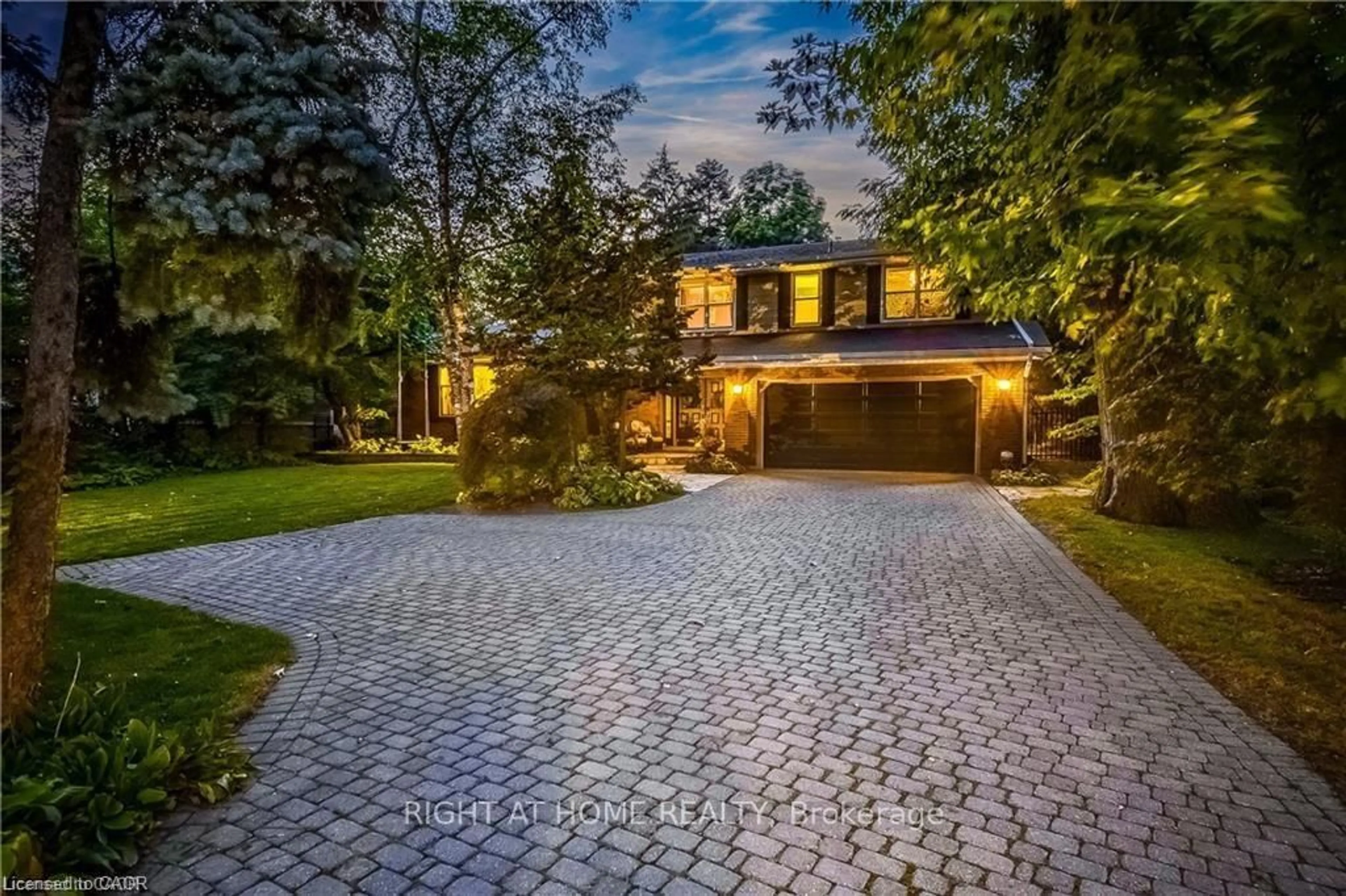 Home with brick exterior material, street for 3021 Lakeshore Rd, Burlington Ontario L7N 1A2